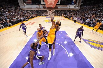 LOS ANGELES, CA - DECEMBER 9: Jordan Hill #27 of the Los Angeles Lakers dunks against the Sacramento Kings on December 9, 2014 at STAPLES Center in Los Angeles, California. NOTE TO USER: User expressly acknowledges and agrees that, by downloading and/or u