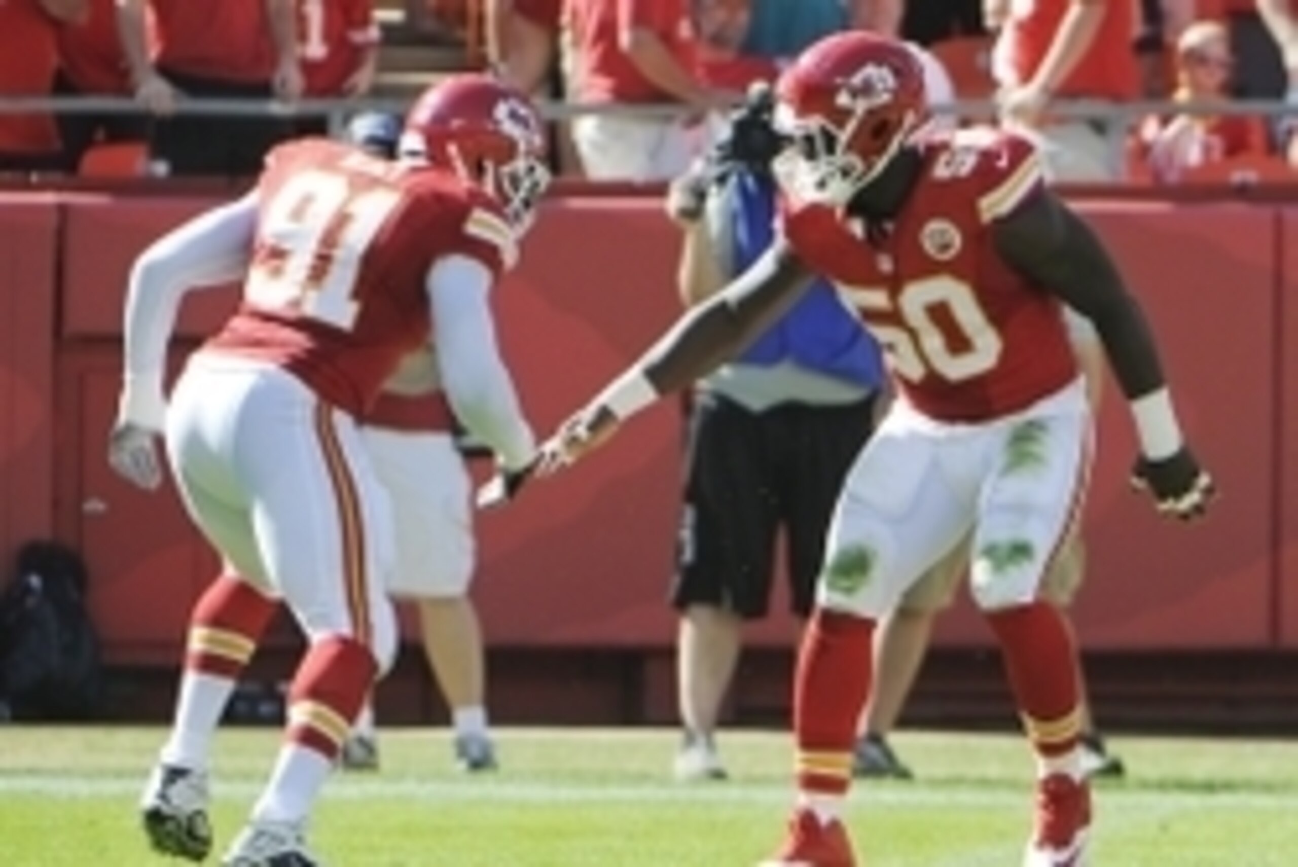 Oct 26, 2014; Kansas City, MO, USA; Kansas City Chiefs outside linebacker Justin Houston (50) celebrates with linebacker Tamba Hali (91) after making a sack against the St. Louis Rams in the first half at Arrowhead Stadium. Mandatory Credit: John Rieger-U Oct 26, 2014; Kansas City, MO, USA; Kansas City Chiefs outside linebacker Justin Houston (50) celebrates with linebacker Tamba Hali (91) after making a sack against the St. Louis Rams in the first half at Arrowhead Stadium. Mandatory Credit: John Rieger-U