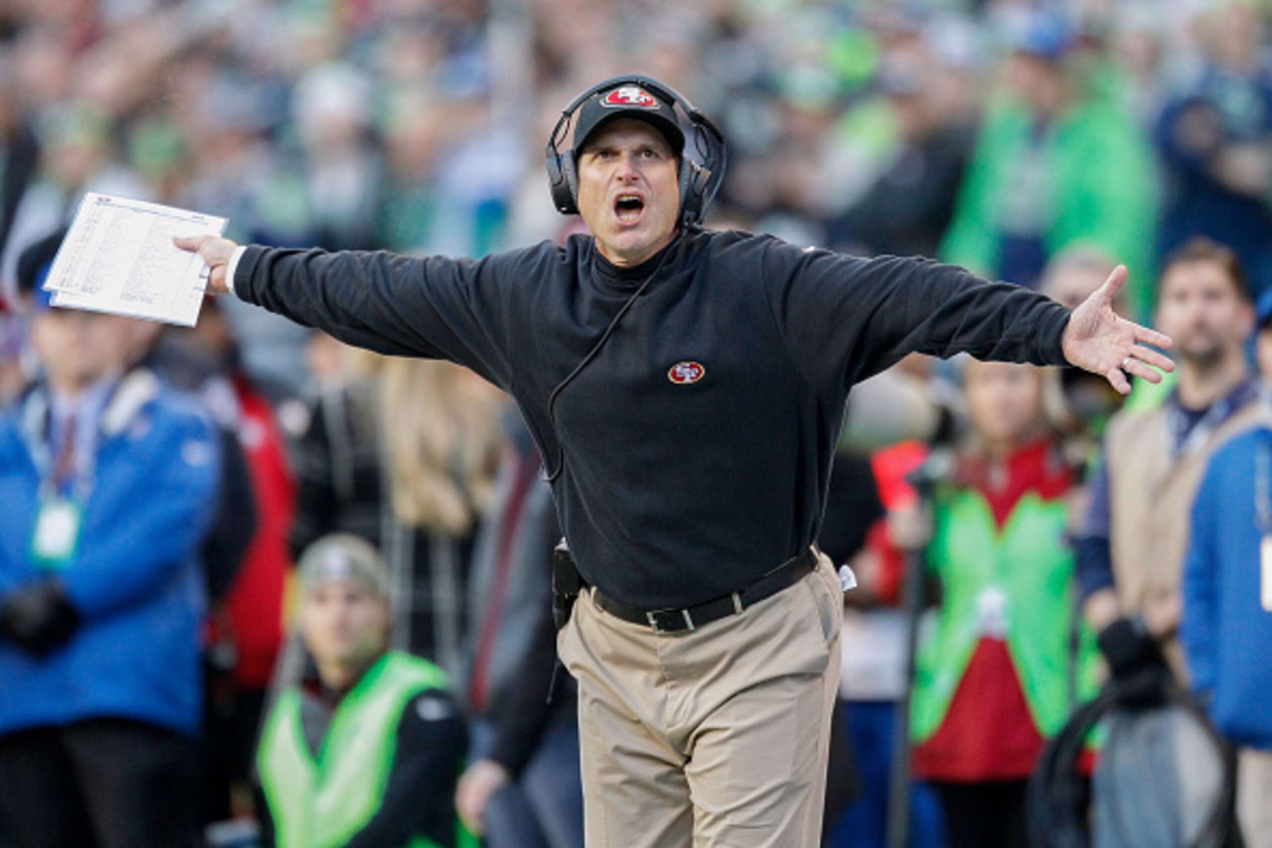 SEATTLE, WA - DECEMBER 14: Head coach Jim Harbaugh of the San Francisco 49ers reacts during the game against the Seattle Seahawks at CenturyLink Field on December 14, 2014 in Seattle, Washington. The Seahawks defeated the 49ers 17-7. (Photo by Otto Greu SEATTLE, WA - DECEMBER 14: Head coach Jim Harbaugh of the San Francisco 49ers reacts during the game against the Seattle Seahawks at CenturyLink Field on December 14, 2014 in Seattle, Washington. The Seahawks defeated the 49ers 17-7. (Photo by Otto Greu