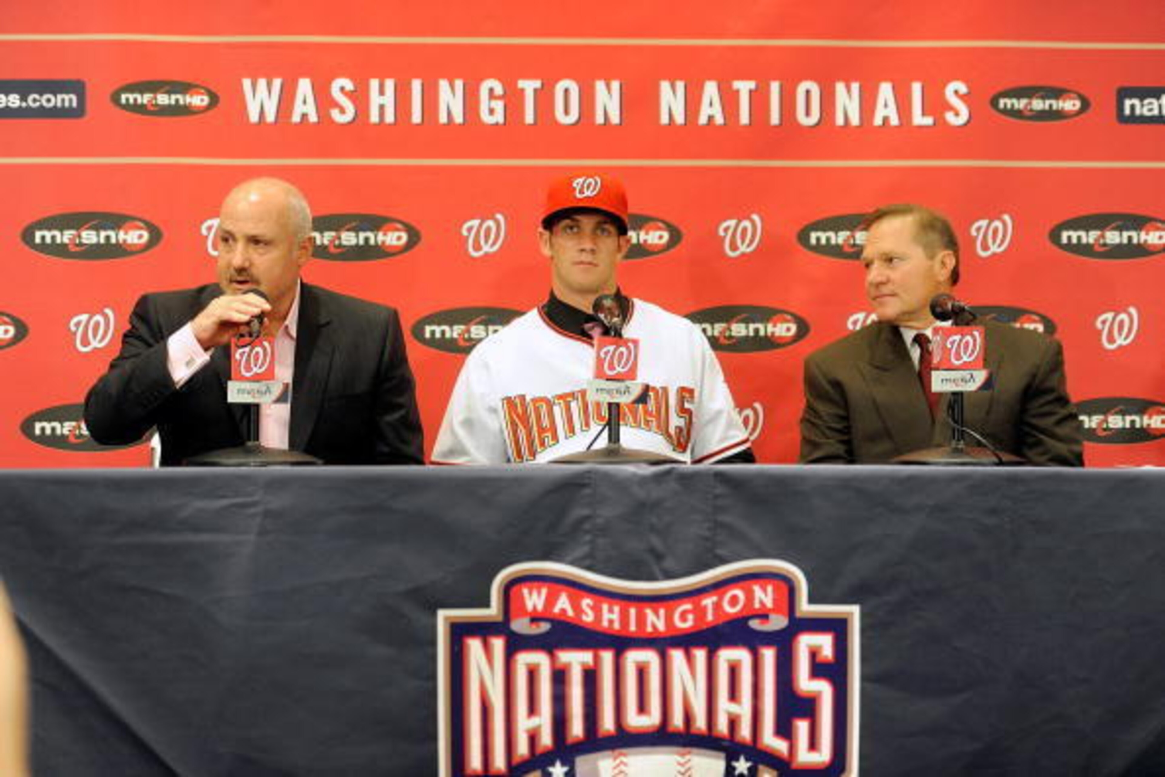 WASHINGTON - AUGUST 26: General Manger Mike Rizzo, Bryce Harper #34 of the Washington Nationals and Scott Boras talk to the media during a press conference at Nationals Park on August 26, 2010 in Washington, DC. (Photo by Greg Fiume/Getty Images) WASHINGTON - AUGUST 26: General Manger Mike Rizzo, Bryce Harper #34 of the Washington Nationals and Scott Boras talk to the media during a press conference at Nationals Park on August 26, 2010 in Washington, DC. (Photo by Greg Fiume/Getty Images)