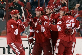 GLENDALE, AZ - DECEMBER 11:  Keith Yandle #3, Shane Doan #19, Oliver Ekman-Larsson #23, and Antoine Vermette #50 of the Arizona Coyotes celebrate a first period goal against the Nashville Predators at Gila River Arena on December 11, 2014 in Glendale, Ari