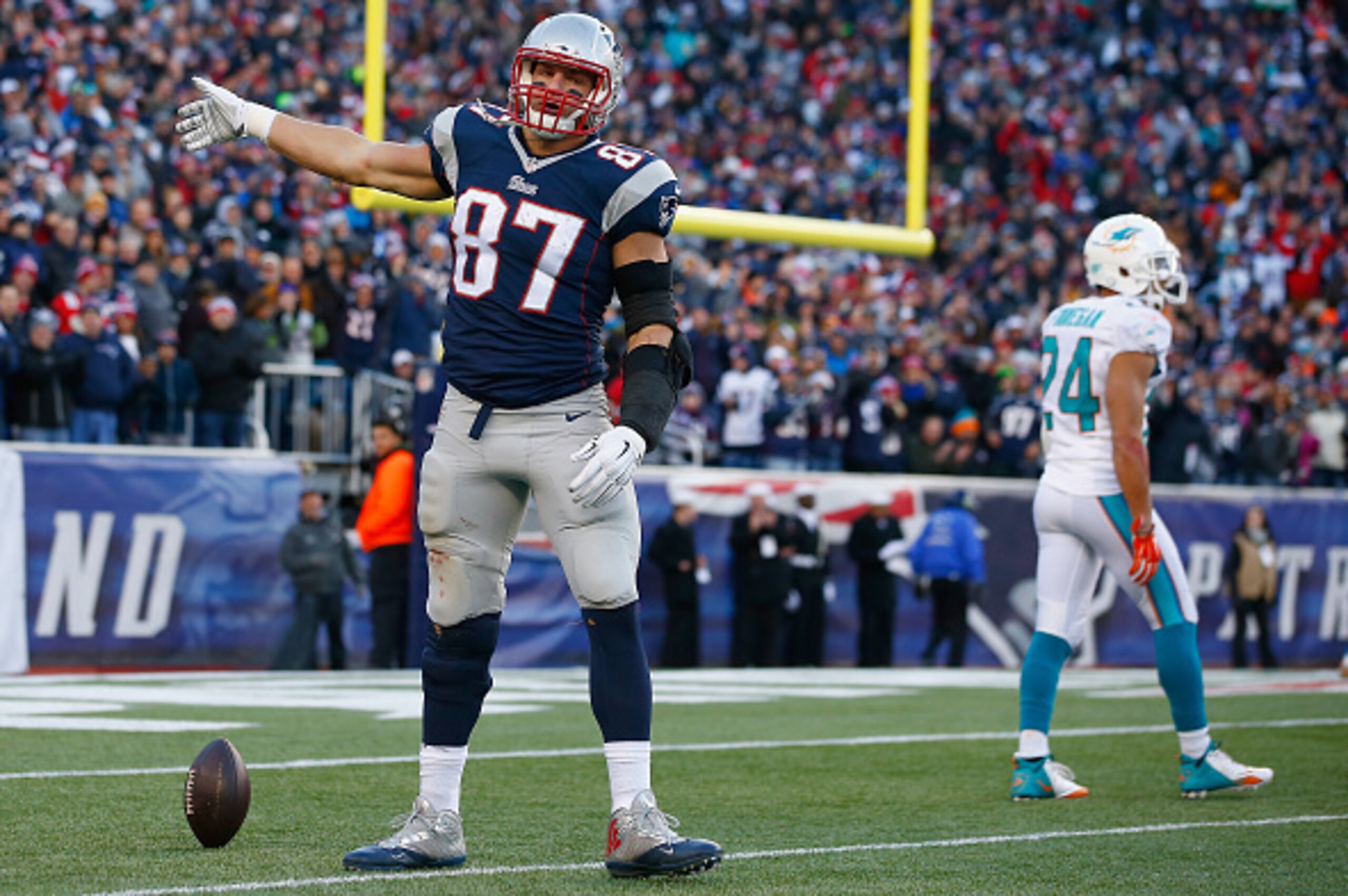 FOXBORO, MA - DECEMBER 14:  Rob Gronkowski #87 of the New England Patriots reacts after catching a pass during the fourth quarter against the Miami Dolphins at Gillette Stadium on December 14, 2014 in Foxboro, Massachusetts.  (Photo by Jared Wickerham/Get
