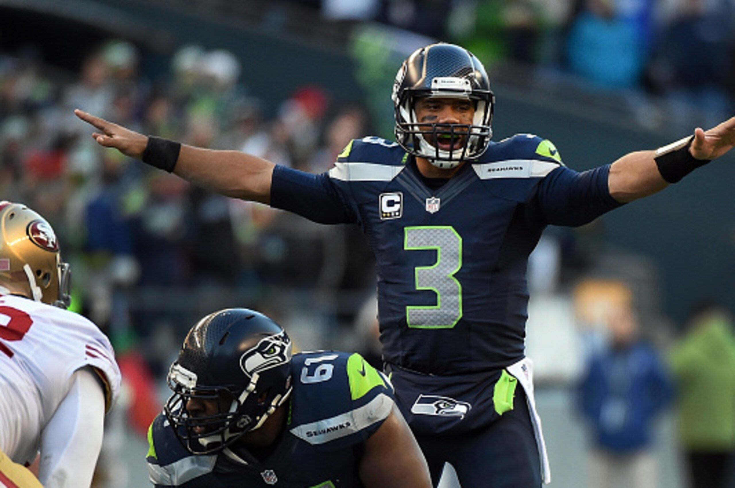 SEATTLE, WA - DECEMBER 14: Quarterback Russell Wilson #3 of the Seattle Seahawks calls out a play during the third quarter of the game against the San Francisco 49ers at CenturyLink Field on December 14, 2014 in Seattle, Washington. (Photo by Steve Dykes/ SEATTLE, WA - DECEMBER 14: Quarterback Russell Wilson #3 of the Seattle Seahawks calls out a play during the third quarter of the game against the San Francisco 49ers at CenturyLink Field on December 14, 2014 in Seattle, Washington. (Photo by Steve Dykes/