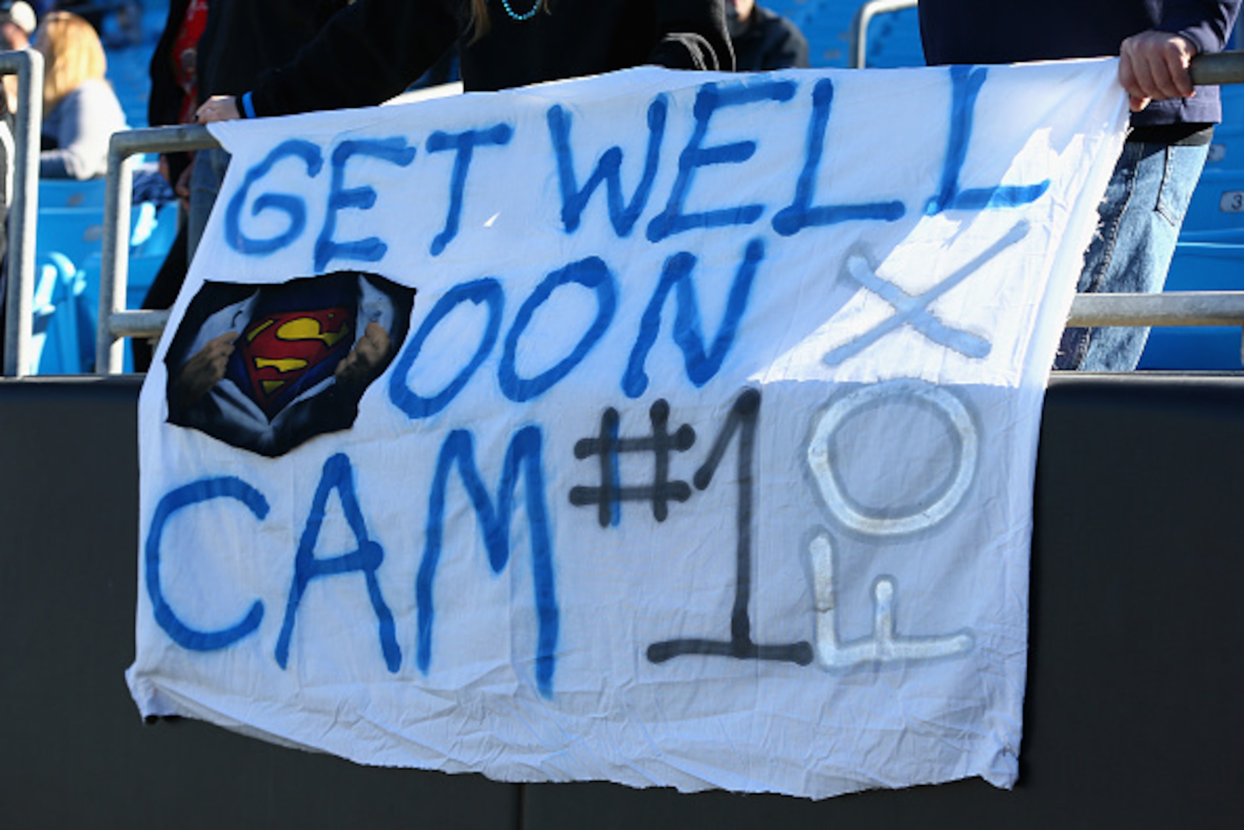 CHARLOTTE, NC - DECEMBER 14:  Carolina Panthers fans show best wishes for the recently injured Cam Newton before the game against the Tampa Bay Buccaneers  at Bank of America Stadium on December 14, 2014 in Charlotte, North Carolina.  (Photo by Streeter L