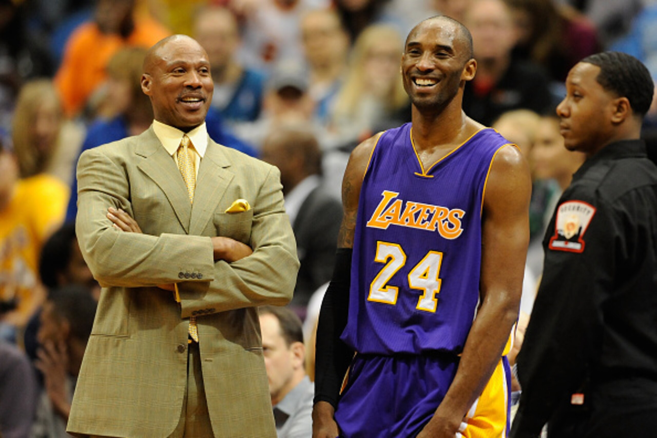 MINNEAPOLIS, MN - DECEMBER 14: Byron Scott of the Los Angeles Lakers speaks with Kobe Bryant #24 during a time out in the fourth quarter of the game against the Minnesota Timberwolves on December 14, 2014 at Target Center in Minneapolis, Minnesota. The La
