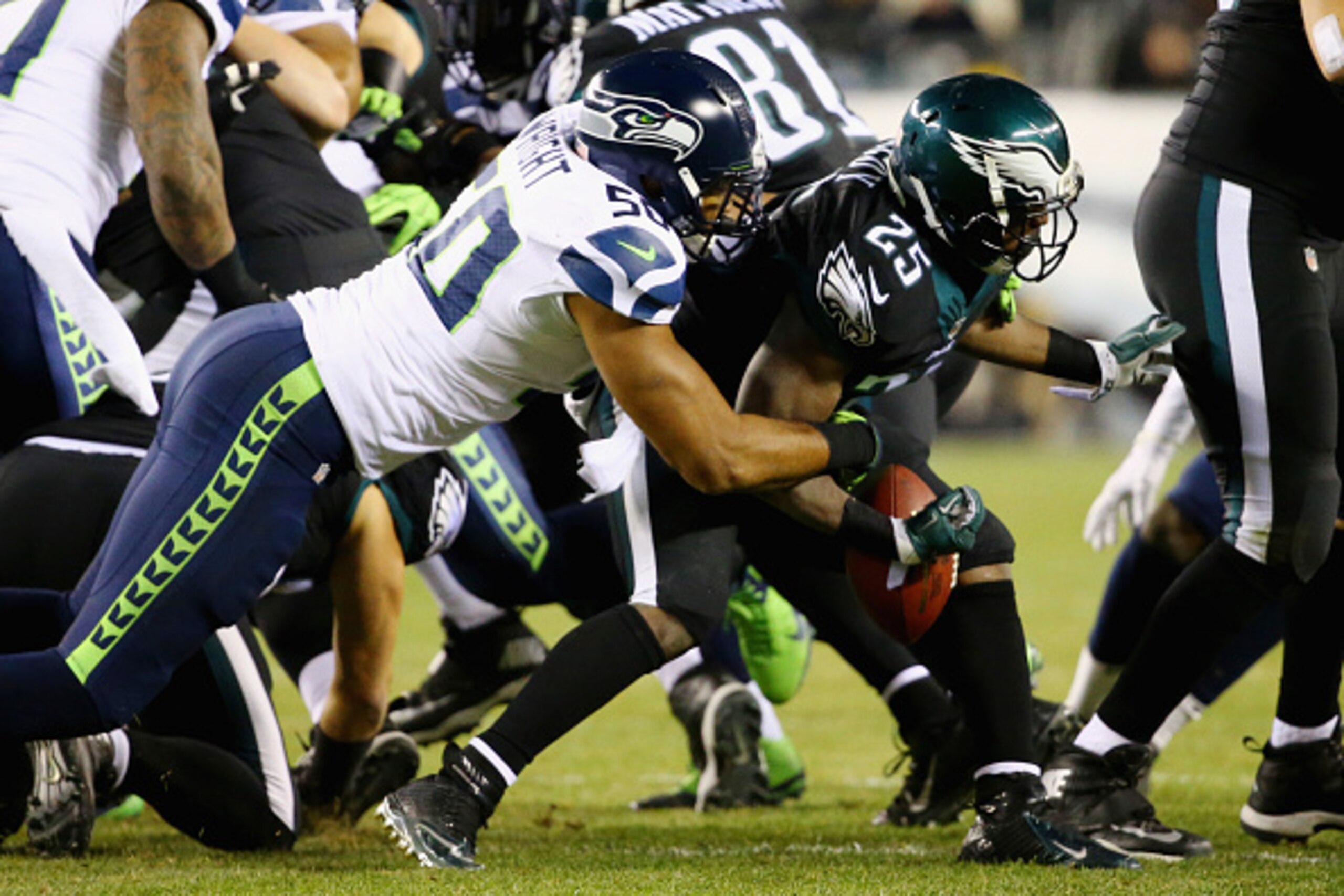 PHILADELPHIA, PA - DECEMBER 07: LeSean McCoy #25 of the Philadelphia Eagles fumbles the ball and it is recovered by K.J. Wright #50 of the Seattle Seahawks during the third quarter of the game at Lincoln Financial Field on December 7, 2014 in Philadelphi PHILADELPHIA, PA - DECEMBER 07: LeSean McCoy #25 of the Philadelphia Eagles fumbles the ball and it is recovered by K.J. Wright #50 of the Seattle Seahawks during the third quarter of the game at Lincoln Financial Field on December 7, 2014 in Philadelphi