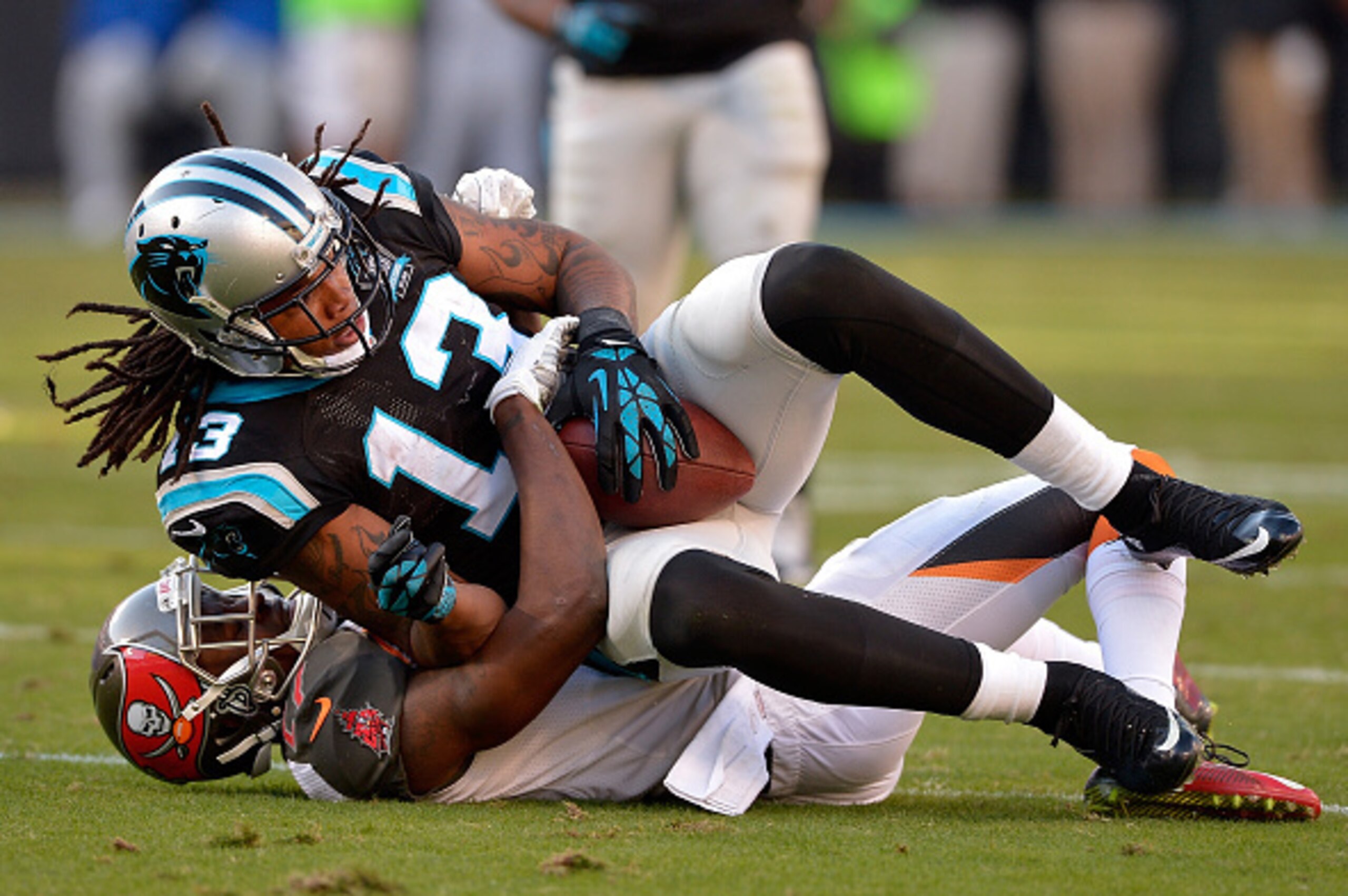 CHARLOTTE, NC - DECEMBER 14:  Kelvin Benjamin #13 of the Carolina Panthers protects the ball after a 2nd half reception against the Tampa Bay Buccaneersduring their game at Bank of America Stadium on December 14, 2014 in Charlotte, North Carolina.  (Photo