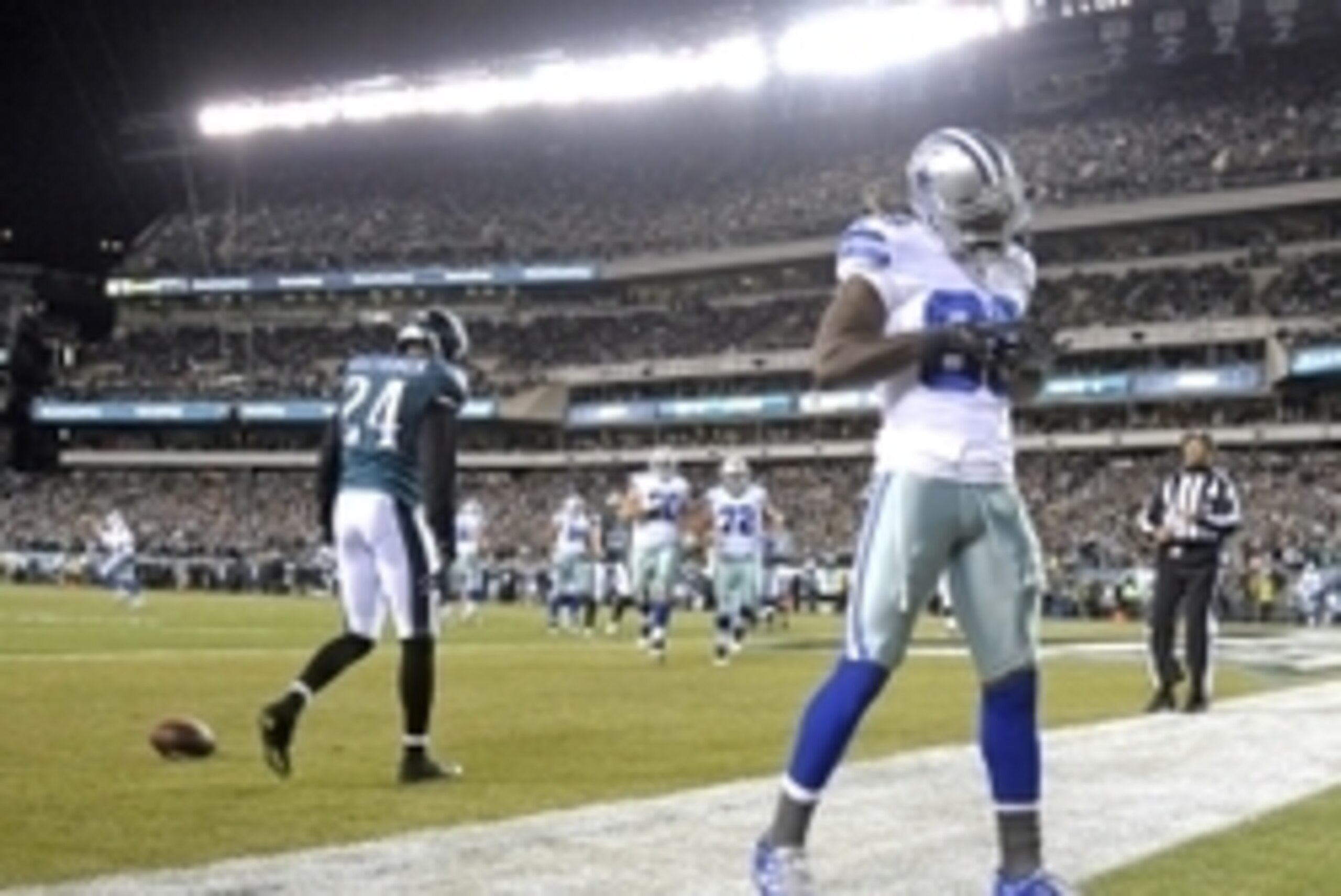 Dec 14, 2014; Philadelphia, PA, USA; Dallas Cowboys wide receiver Dez Bryant (88) celebrates his touchdown catch in the second quarter against Philadelphia Eagles cornerback Bradley Fletcher (24) at Lincoln Financial Field. The Cowboys defeated the Eagles