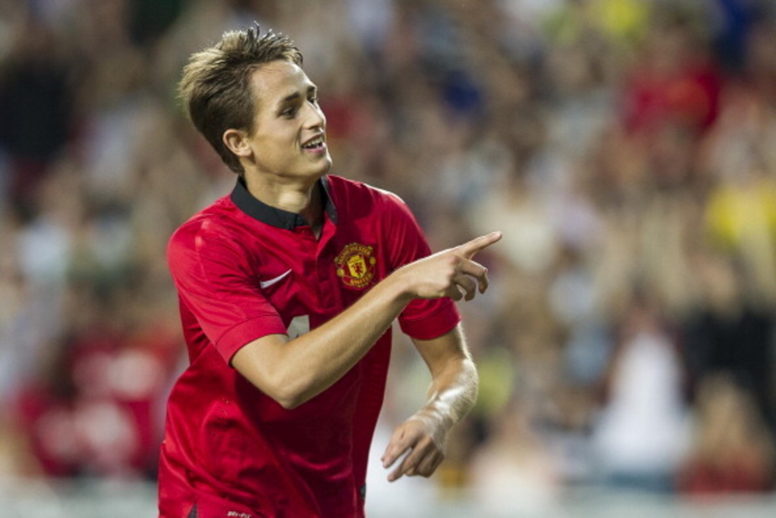 SO KON PO, HONG KONG - JULY 29:  Adnan Januzaj of Manchester United celebrates his goal during the international friendly match between Kitchee FC and Manchester United at Hong Kong Stadium on July 29, 2013 in So Kon Po, Hong Kong.  (Photo by Victor Frail