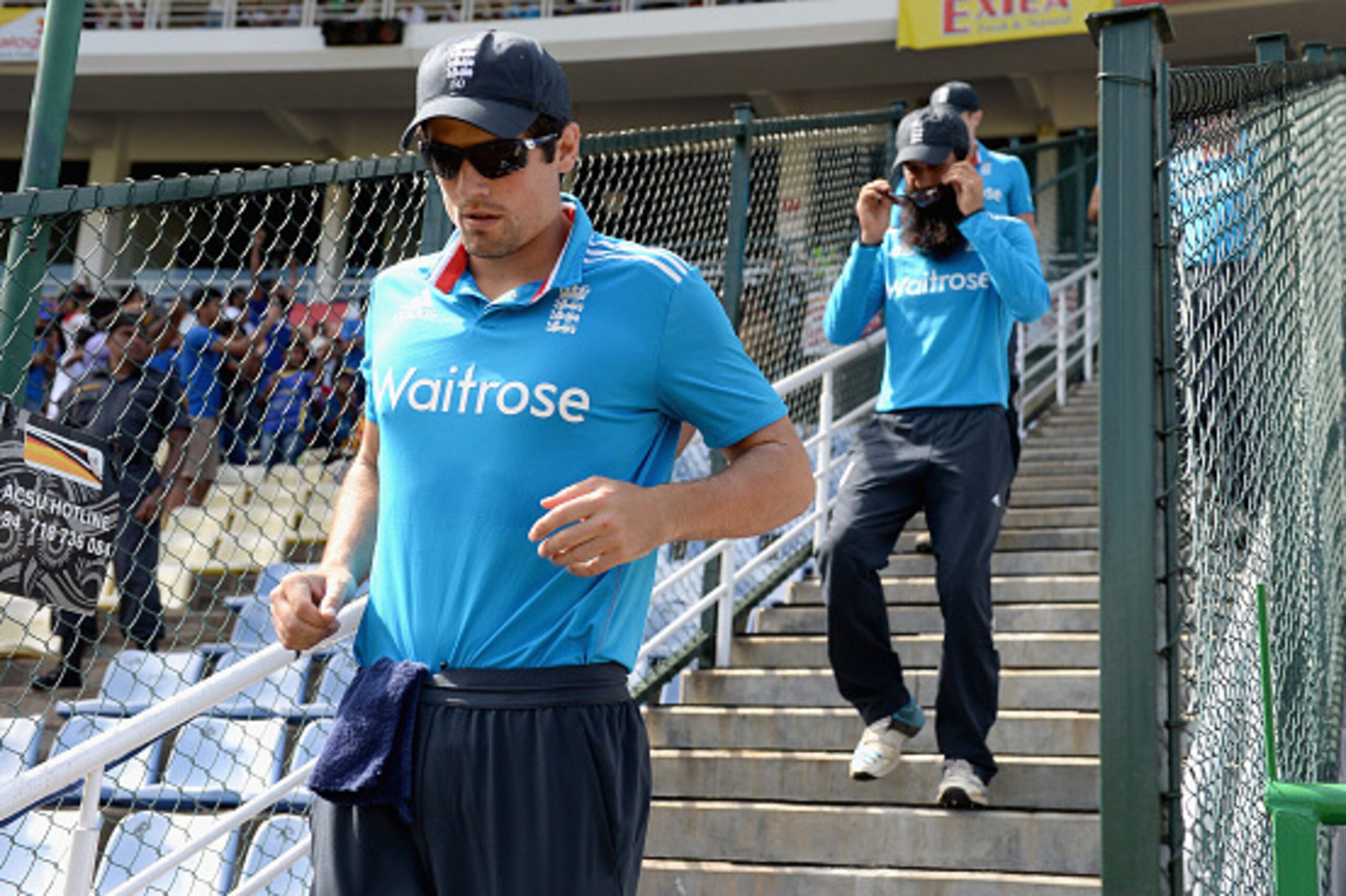KANDY, SRI LANKA - DECEMBER 13:  England captain Alastair Cook leads his team on to the field ahead of the 6th One Day International match between Sri Lanka and England at Pallekele Cricket Stadium on December 13, 2014 in Kandy, Sri Lanka.  (Photo by Gare