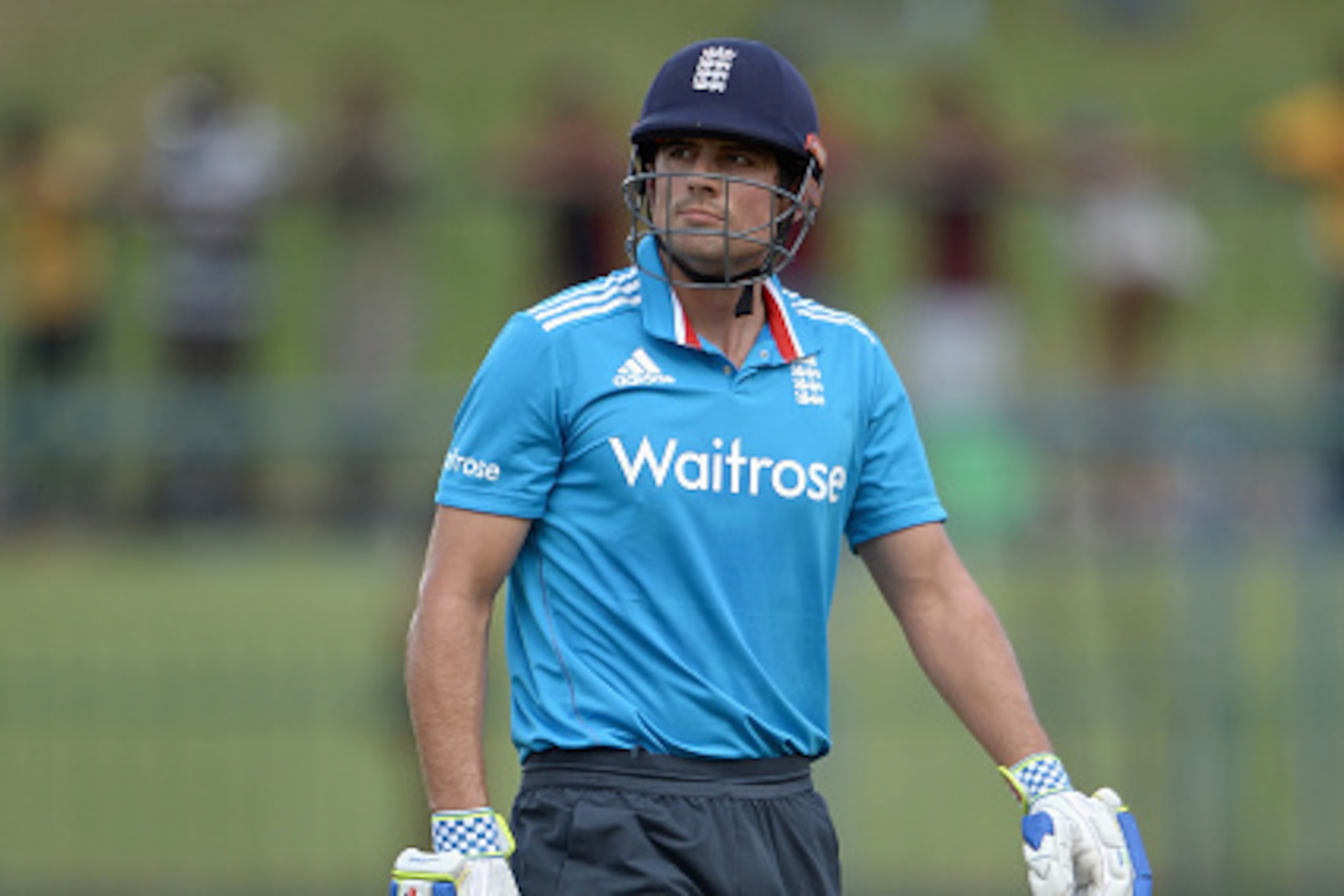 KANDY, SRI LANKA - DECEMBER 11:  England captain Alastair Cook leaves the field after being dismissed by Sachithra Senanayake of Sri Lanka during the 5th One Day International between Sri Lanka and England at Pallekele Cricket Stadium on December 11, 2014