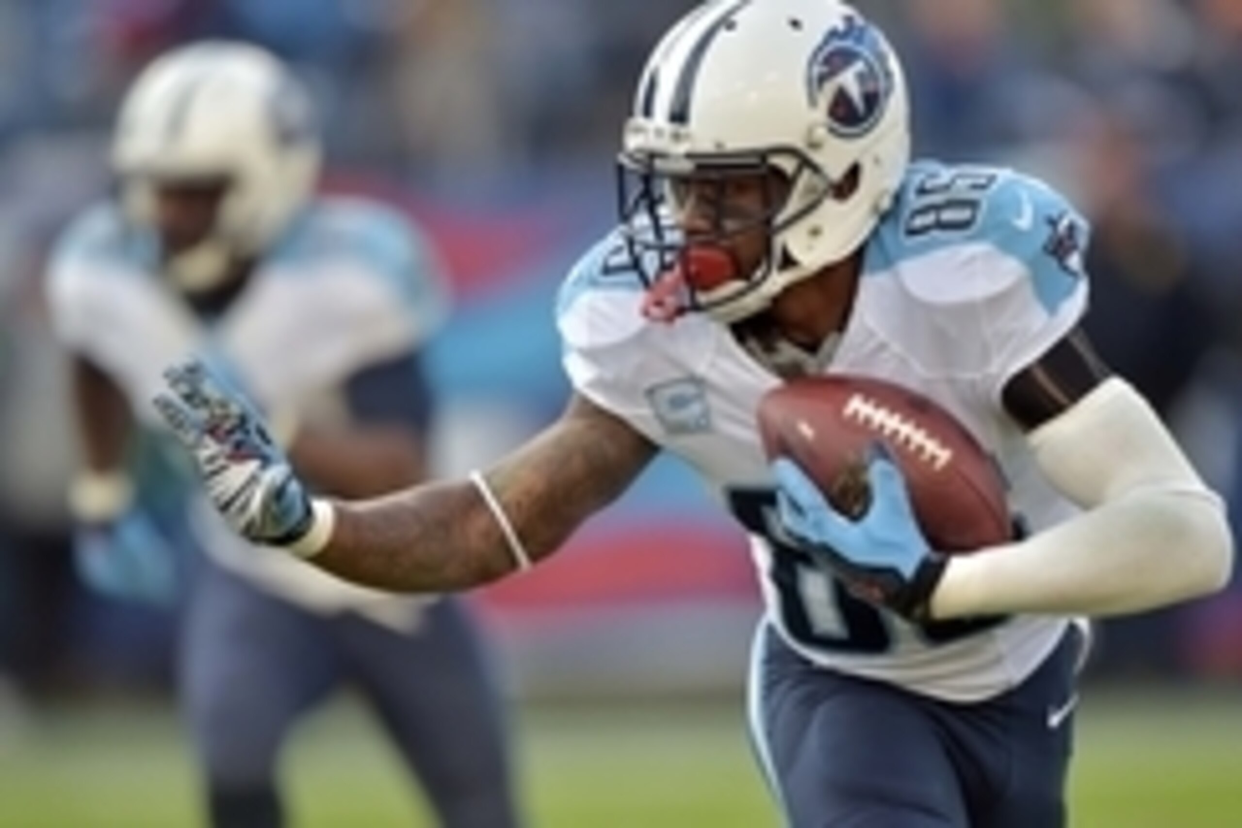 Dec 7, 2014; Nashville, TN, USA; Tennessee Titans wide receiver Nate Washington (85) carries the ball against the New York Giants during the second half at LP Field. The Giants beat the Titans 36-7. Mandatory Credit: Don McPeak-USA TODAY Sports
