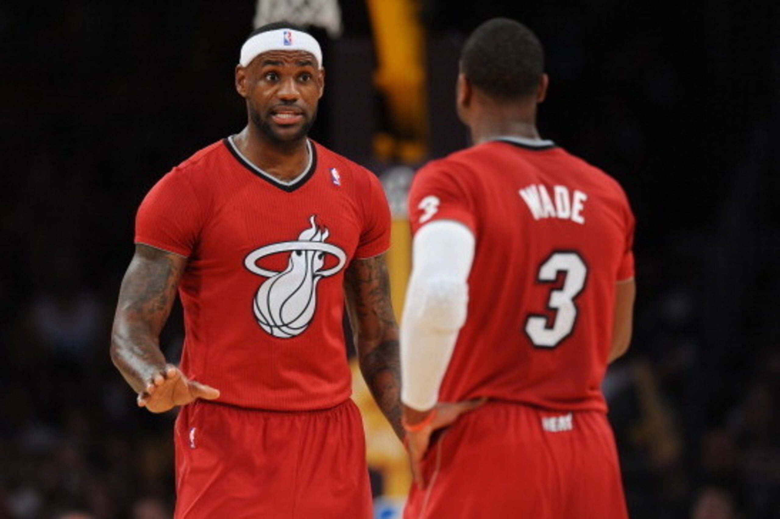 LOS ANGELES, CA - DECEMBER 25: LeBron James and Dwyane Wade #3 of the Miami Heat converse during a game against the Los Angeles Lakers at STAPLES Center on December 25, 2013 in Los Angeles, California. NOTE TO USER: User expressly acknowledges and agrees LOS ANGELES, CA - DECEMBER 25: LeBron James and Dwyane Wade #3 of the Miami Heat converse during a game against the Los Angeles Lakers at STAPLES Center on December 25, 2013 in Los Angeles, California. NOTE TO USER: User expressly acknowledges and agrees