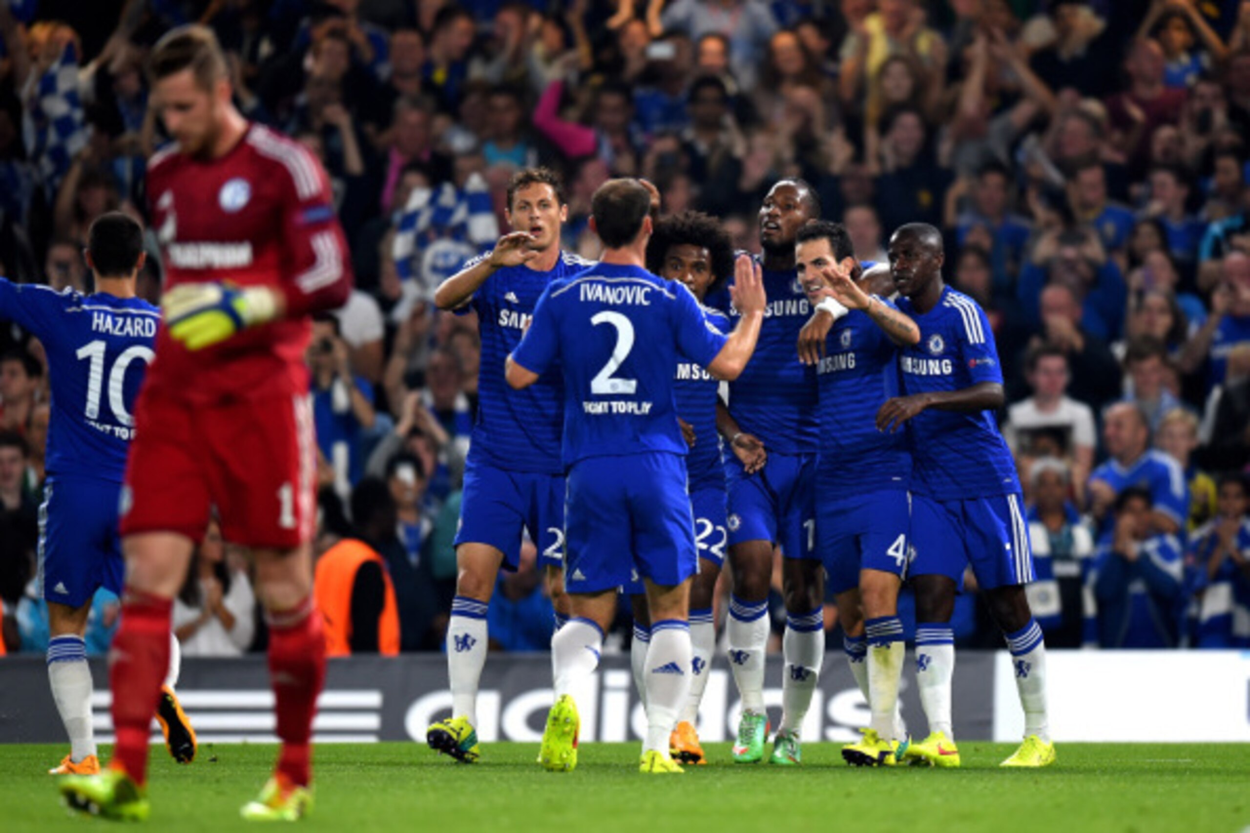 LONDON, ENGLAND - SEPTEMBER 17: Cesc Fabregas (2nd R) #4 of Chelsea celebrates with teammates after scoring the opening goal during the UEFA Champions League Group G match between Chelsea and FC Schalke 04 on September 17, 2014 in London, United Kingdom. LONDON, ENGLAND - SEPTEMBER 17: Cesc Fabregas (2nd R) #4 of Chelsea celebrates with teammates after scoring the opening goal during the UEFA Champions League Group G match between Chelsea and FC Schalke 04 on September 17, 2014 in London, United Kingdom.