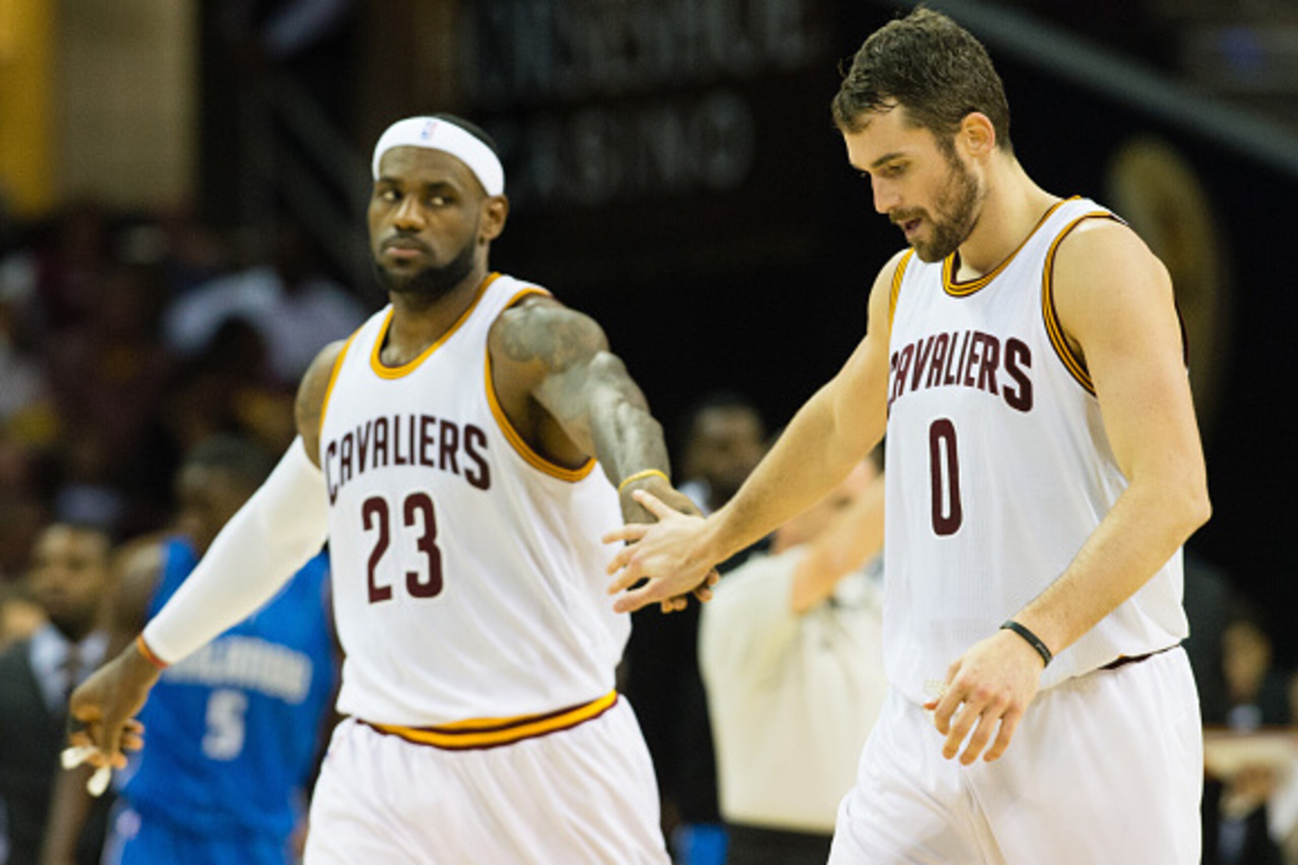 CLEVELAND, OH - NOVEMBER 24: LeBron James #23 celebrates with Kevin Love #0 of the Cleveland Cavaliers during the first half against the Orlando Magic at Quicken Loans Arena on November 24, 2014 in Cleveland, Ohio. NOTE TO USER: User expressly acknowledge CLEVELAND, OH - NOVEMBER 24: LeBron James #23 celebrates with Kevin Love #0 of the Cleveland Cavaliers during the first half against the Orlando Magic at Quicken Loans Arena on November 24, 2014 in Cleveland, Ohio. NOTE TO USER: User expressly acknowledge