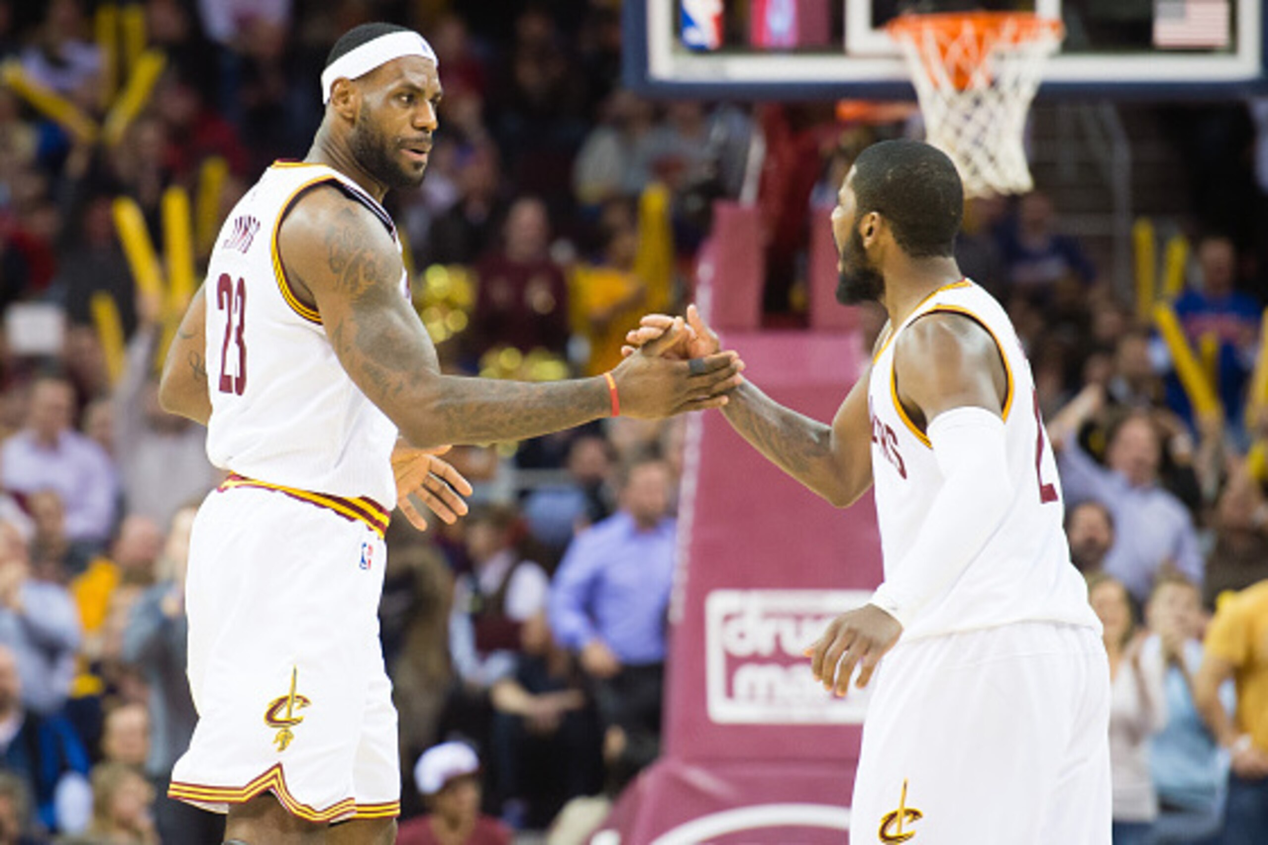 CLEVELAND, OH - DECEMBER 2: LeBron James #23 and Kyrie Irving #2 of the Cleveland Cavaliers celebrate after James scored during the second half against the Milwaukee Bucks at Quicken Loans Arena on December 2, 2014 in Cleveland, Ohio. The Cavaliers defeat CLEVELAND, OH - DECEMBER 2: LeBron James #23 and Kyrie Irving #2 of the Cleveland Cavaliers celebrate after James scored during the second half against the Milwaukee Bucks at Quicken Loans Arena on December 2, 2014 in Cleveland, Ohio. The Cavaliers defeat