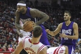 Nov 26, 2014; Houston, TX, USA; Sacramento Kings center DeMarcus Cousins (15) prepares to shoot the ball during the fourth quarter against the Houston Rockets at Toyota Center. The Rockets won 102-89. Mandatory Credit: Troy Taormina-USA TODAY Sports