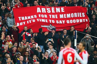 WEST BROMWICH, ENGLAND - NOVEMBER 29:   (EDITORS NOTE: This is a retransmission of image #459708260 with an alternative crop)   Arsenal fans hold up a banner for Arsene Wenger, manager of Arsenal during the Barclays Premier League match between West Bromw