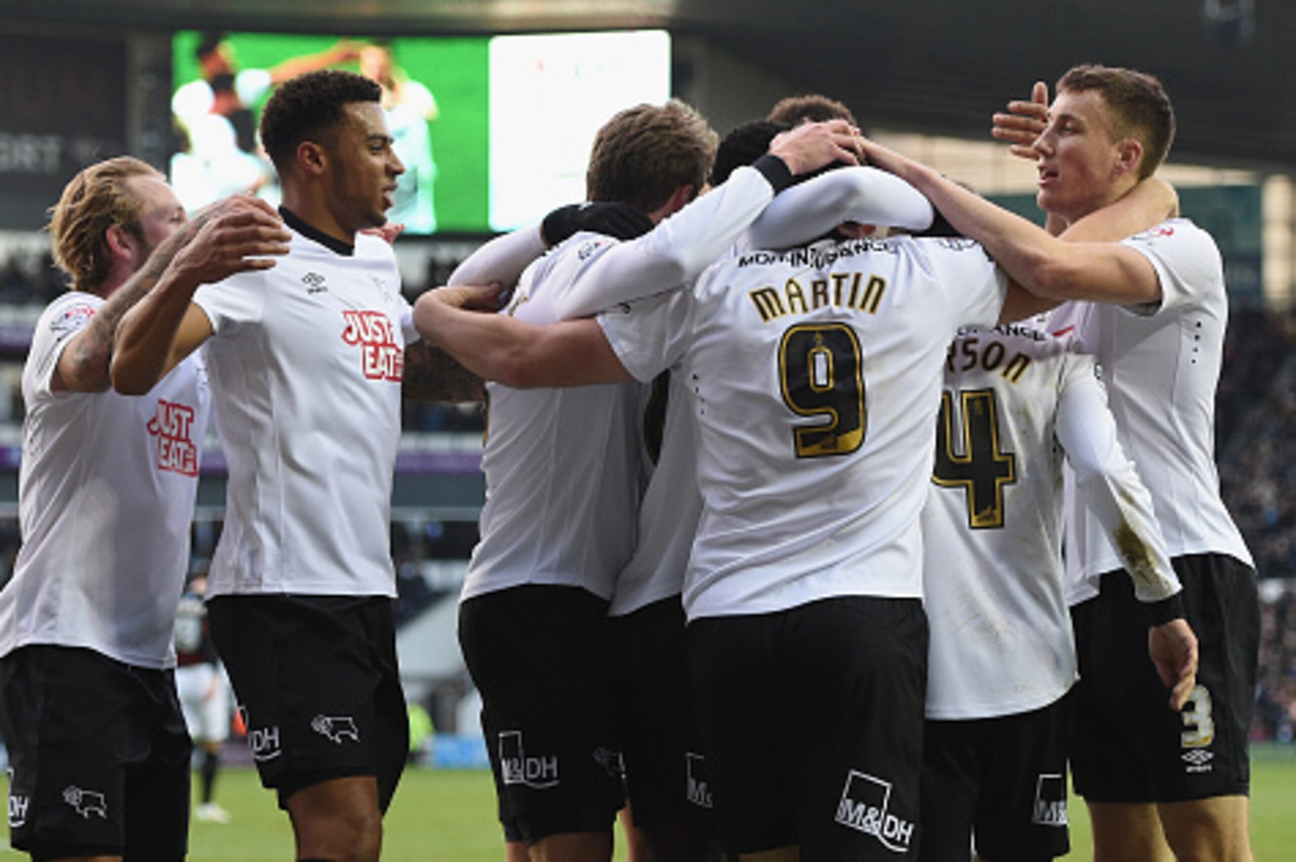 DERBY, ENGLAND - DECEMBER 06:  Chris Martin of Derby celebrates their third goal during the Sky Bet Championship match between Derby County and Brighton & Hove Albion at the Pride Park Stadium on December 6, 2014 in Derby, England.  (Photo by Ross Kinnair