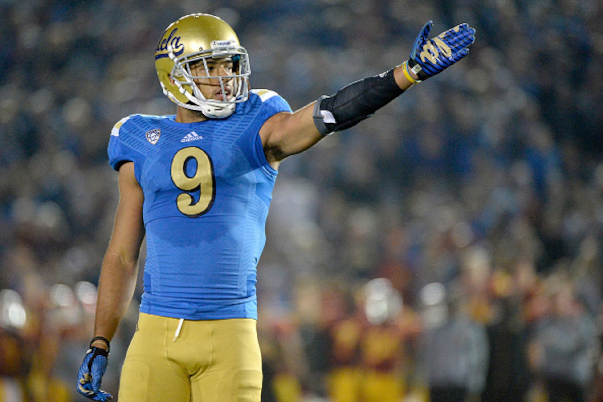 PASADENA, CA - NOVEMBER 22:  Jordan Payton #9 of the UCLA Bruins celebrates a first down during the third quarter against the USC Trojans at the Rose Bowl on November 22, 2014 in Pasadena, California.  UCLA won 38-20.  (Photo by Harry How/Getty Images)