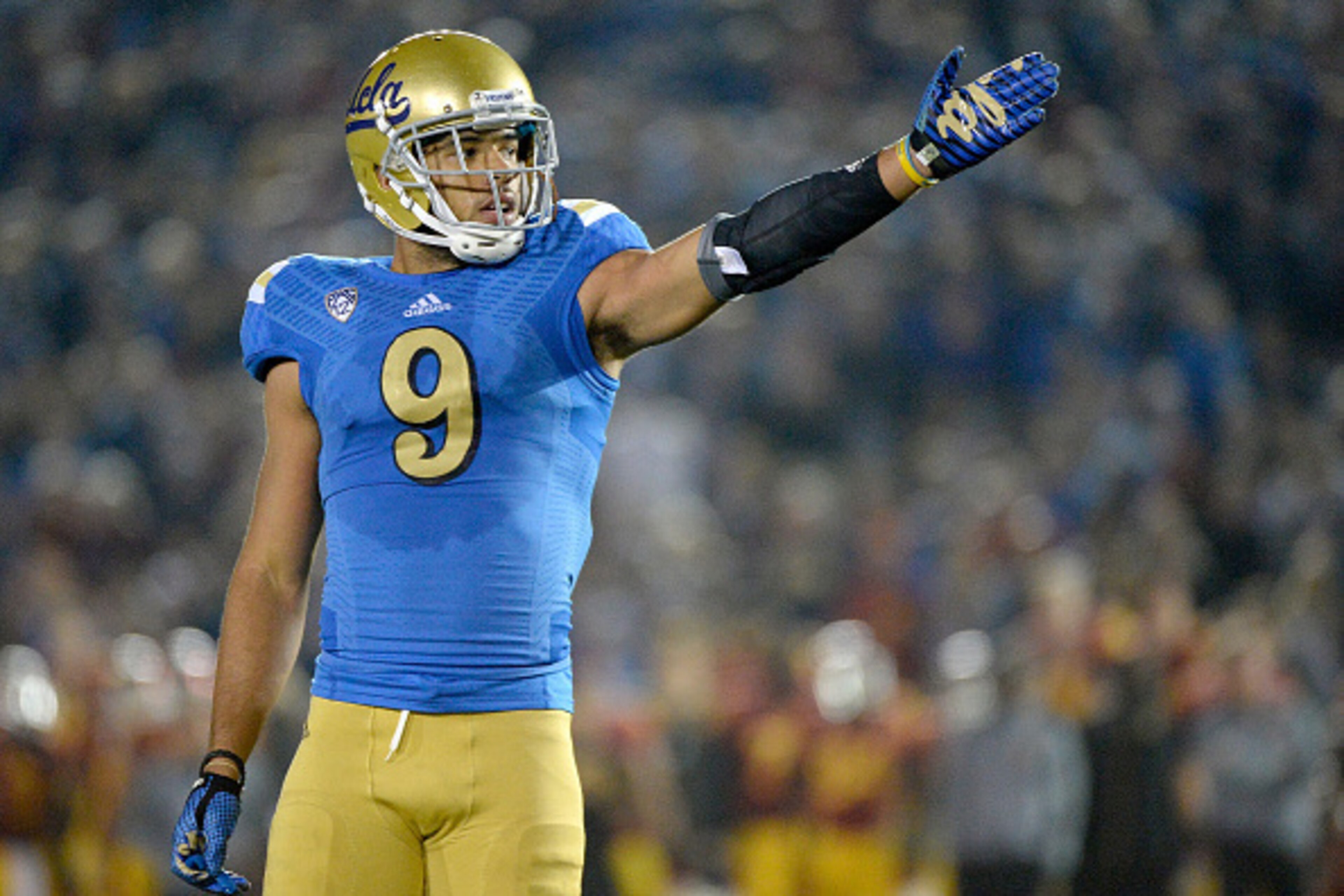 PASADENA, CA - NOVEMBER 22:  Jordan Payton #9 of the UCLA Bruins celebrates a first down during the third quarter against the USC Trojans at the Rose Bowl on November 22, 2014 in Pasadena, California.  UCLA won 38-20.  (Photo by Harry How/Getty Images)