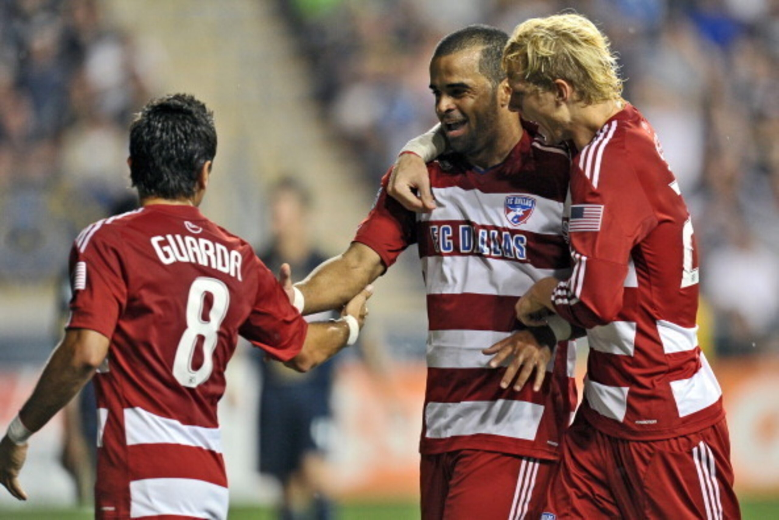 CHESTER, PA- AUGUST 13: Bruno Guarda #8, Maicon Santos #9 and Brek Shea #20 of the FC Dallas celebrate a goal by Santos during the game against the Philadelphia Union at PPL Park on August 13, 2011 in Chester, Pennsylvania. (Photo by Drew Hallowell/Getty 