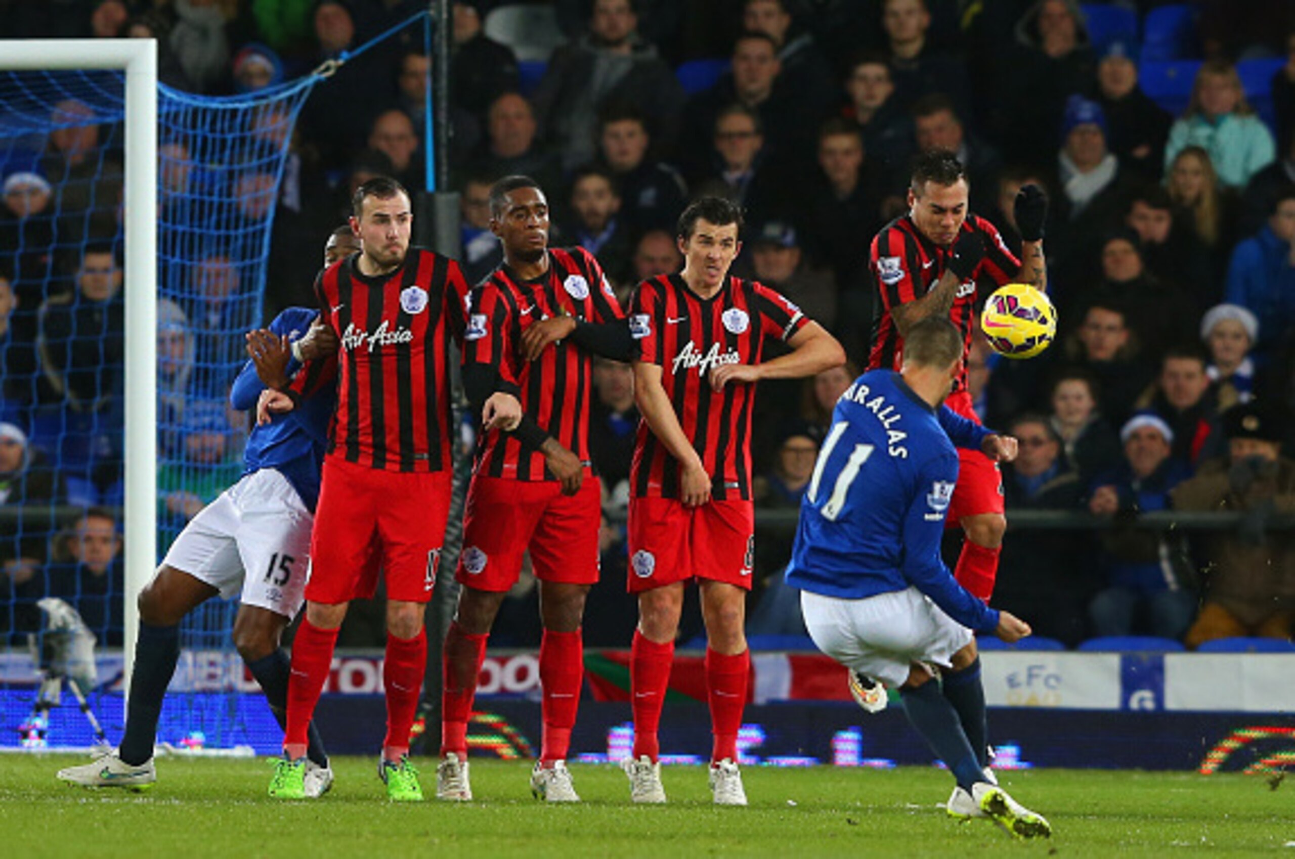 LIVERPOOL, ENGLAND - DECEMBER 15:  Kevin Mirallas of Everton scores their second goal from a free kick during the Barclays Premier League match between Everton and Queens Park Rangers at Goodison Park on December 15, 2014 in Liverpool, England.  (Photo by