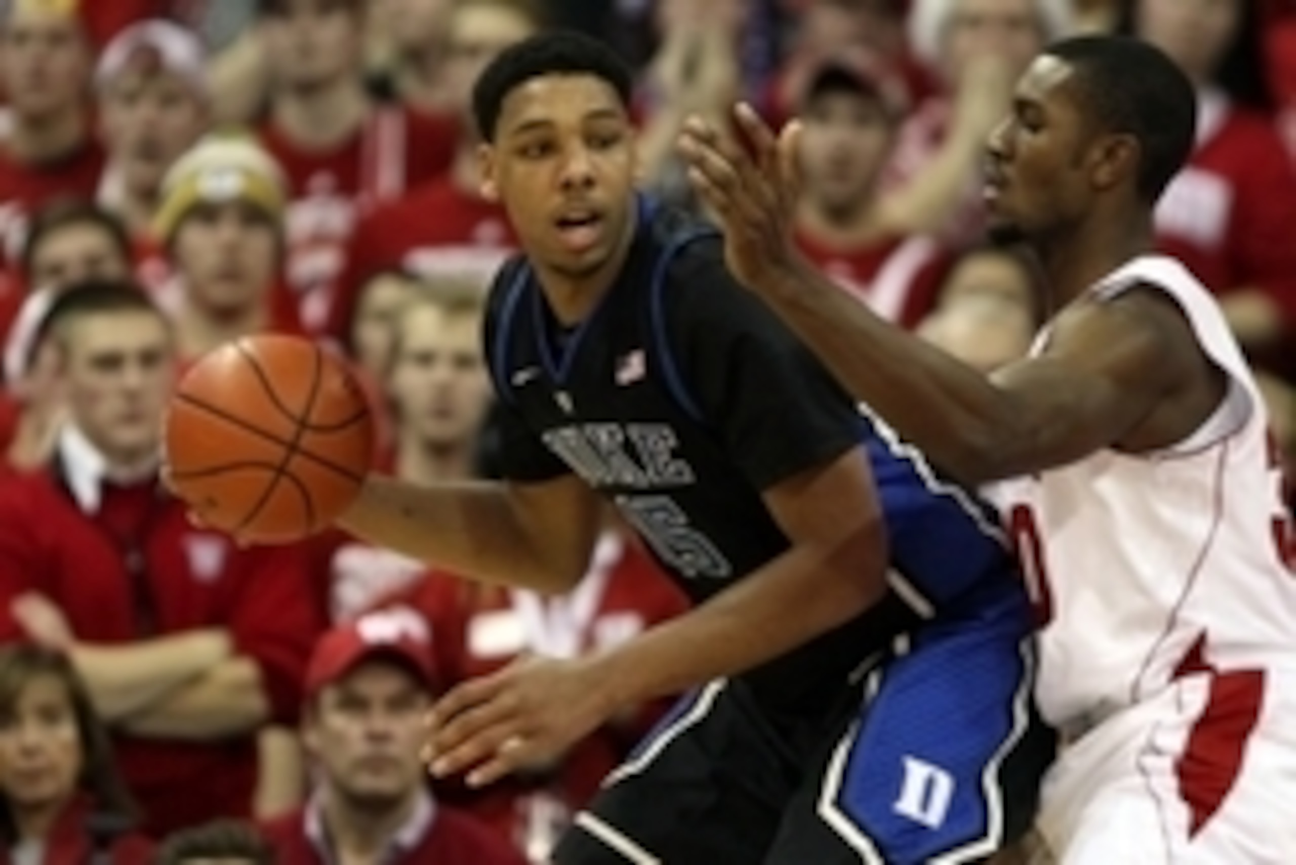 Dec 3, 2014; Madison, WI, USA; Duke Blue Devils center Jahlil Okafor (15) attempts to moves the ball against Wisconsin Badgers forward Vitto Brown (30) at the Kohl Center. Duke defeated Wisconsin 80-70.  Mandatory Credit: Mary Langenfeld-USA TODAY Sports