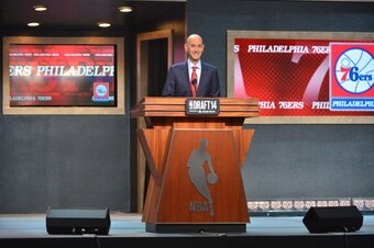 BROOKLYN, NY - JUNE 26: NBA Commissioner Adam Silver addresses the crowd during the 2014 NBA Draft on June 26, 2014 at Barclays Center in Brooklyn, New York. NOTE TO USER: User expressly acknowledges and agrees that, by downloading and or using this photo