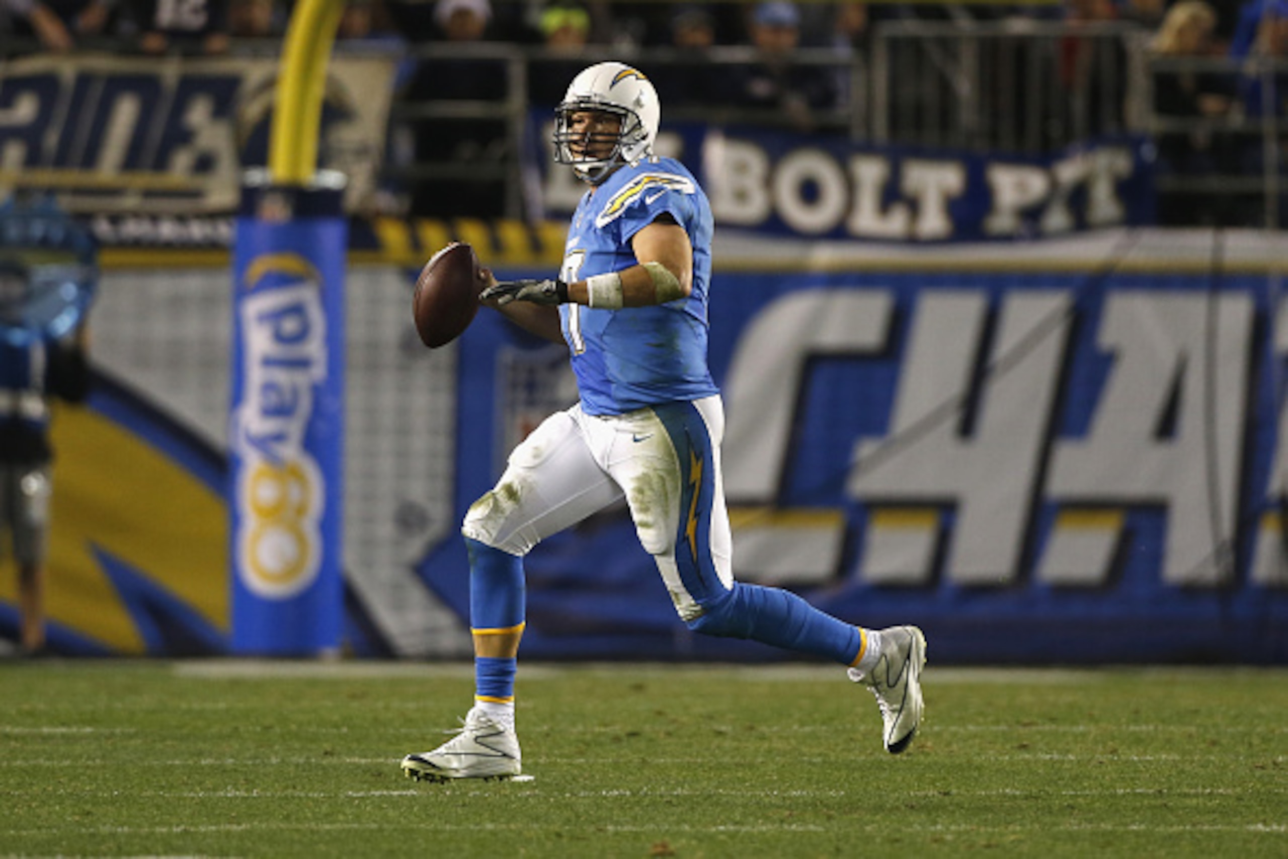 SAN DIEGO, CA - DECEMBER 07:  Quarterback Philip Rivers #17 of the San Diego Chargers looks to pass against the New England Patriots defense at Qualcomm Stadium on December 7, 2014 in San Diego, California.  (Photo by Todd Warshaw/Getty Images)