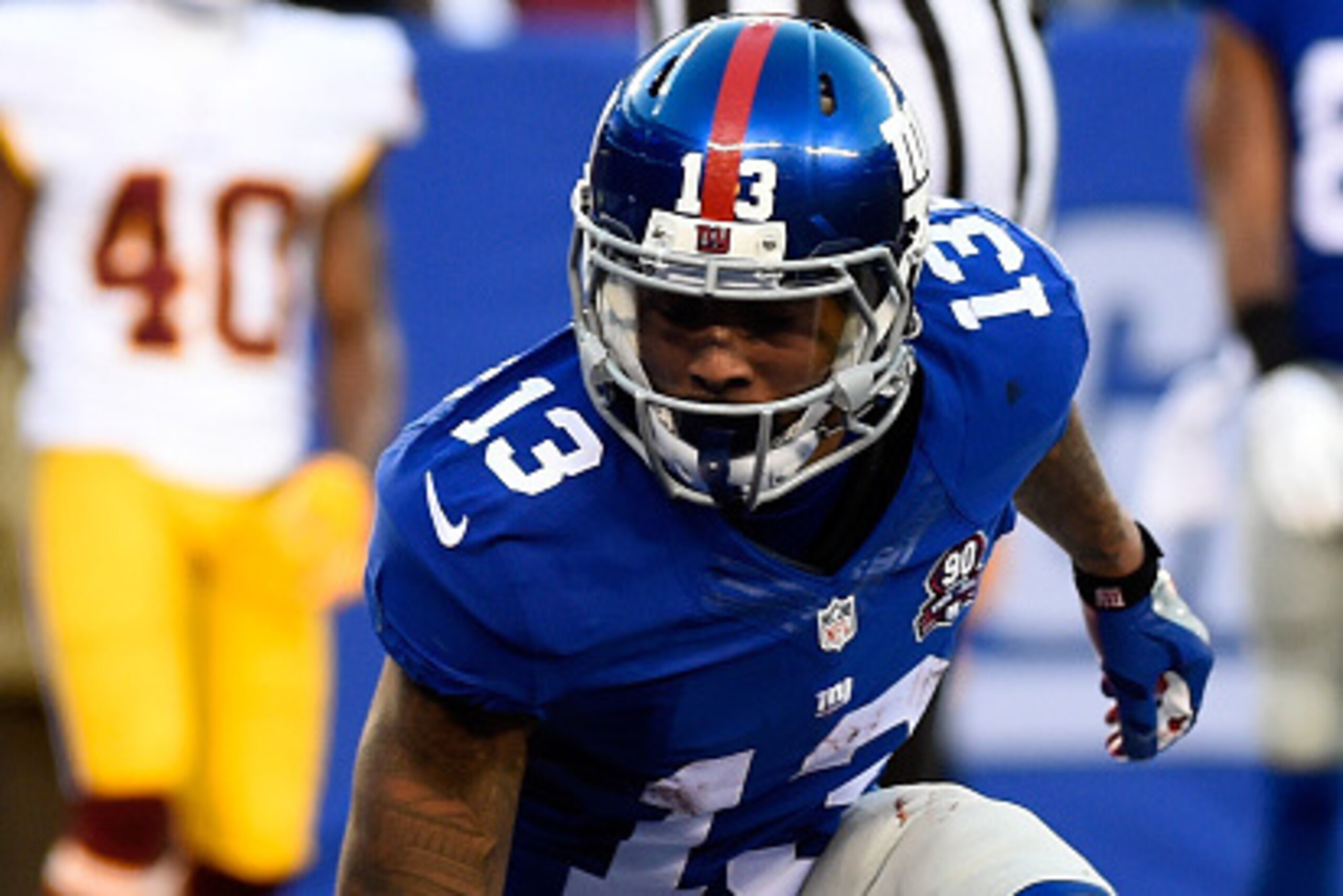 EAST RUTHERFORD, NJ - DECEMBER 14:  Odell Beckham Jr. #13 of the New York Giants celebrates after scoring a 6 yard touchdown in the fourth quarter against the Washington Redskins during their game at MetLife Stadium on December 14, 2014 in East Rutherford