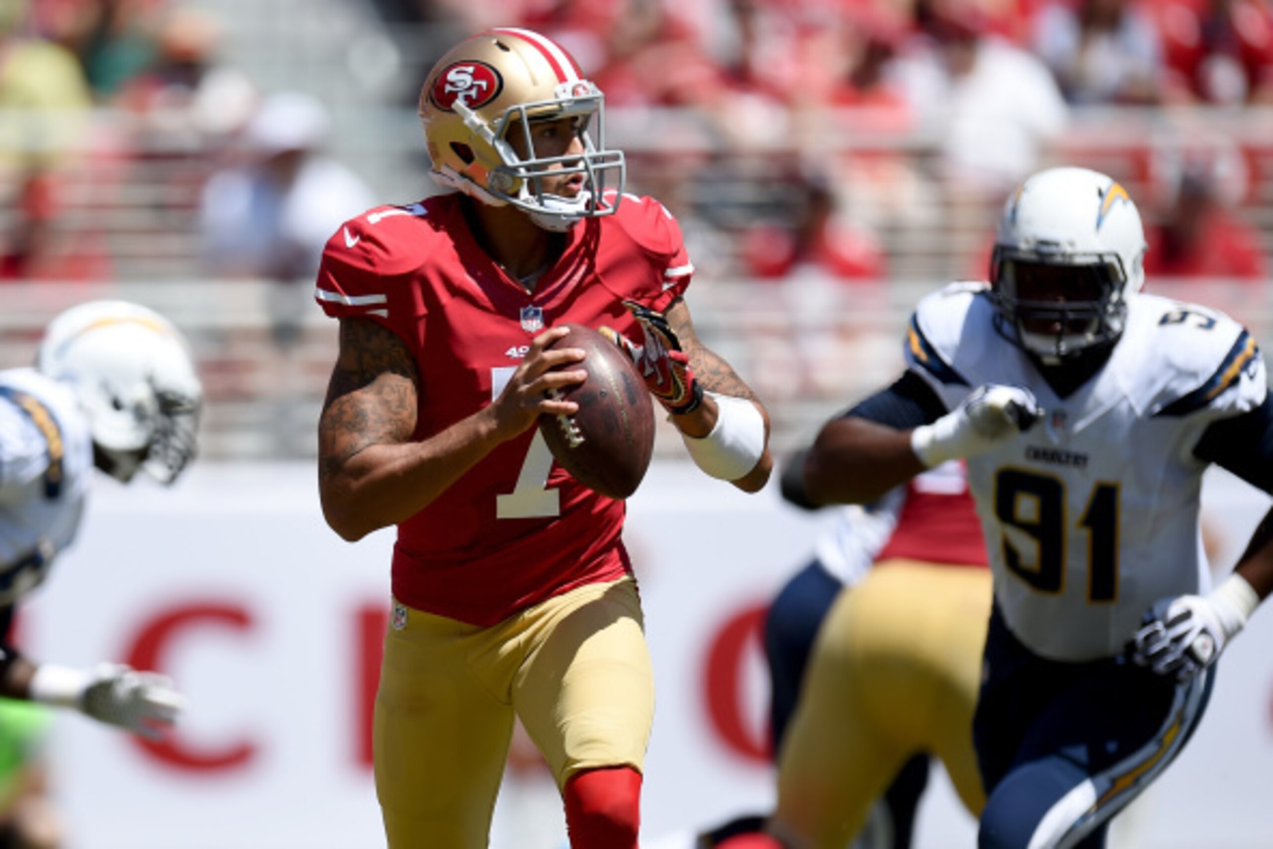 SANTA CLARA, CA - AUGUST 24:  Quarterback Colin Kaepernick #7 of the San Francisco 49ers looks to pass during the preseason game against the San Diego Chargers at Levi's Stadium on August 24, 2014 in Santa Clara, California.  (Photo by Thearon W. Henderso