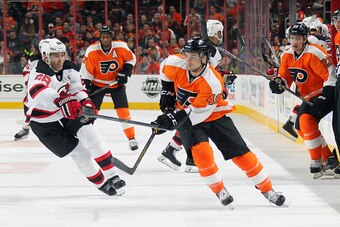 PHILADELPHIA, PA - DECEMBER 11:  Scott Laughton #49, Luke Schenn #22 and Wayne Simmonds #17 of the Philadelphia Flyers in action against Jaromir Jagr #68 of the New Jersey Devils on December 11, 2014 at the Wells Fargo Center in Philadelphia, Pennsylvania