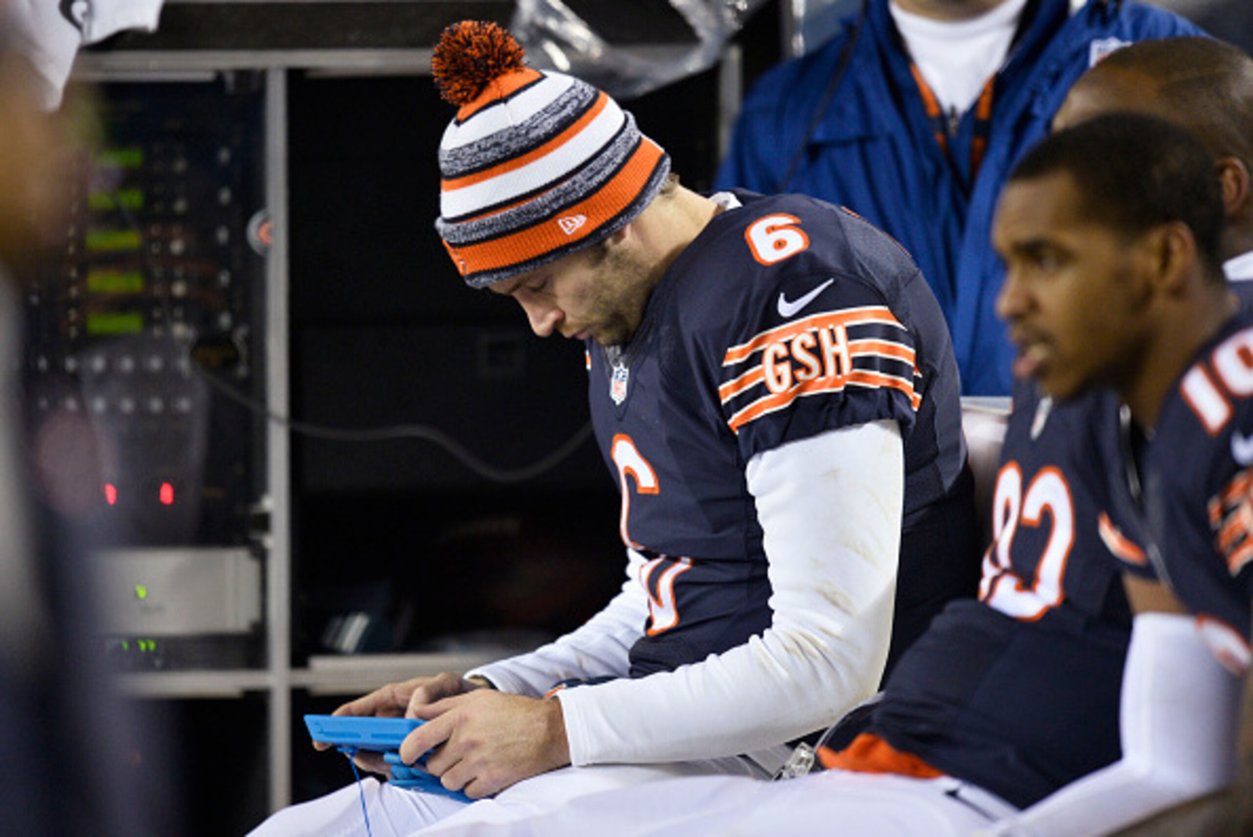 CHICAGO, IL - DECEMBER 15: Jay Cutler #6 of the Chicago Bears looks over a play on a tablet during the third quarter of their loss to the New Orleans Saints at Soldier Field on December 15, 2014 in Chicago, Illinois. The Saints defeated the Bears 31-15. (