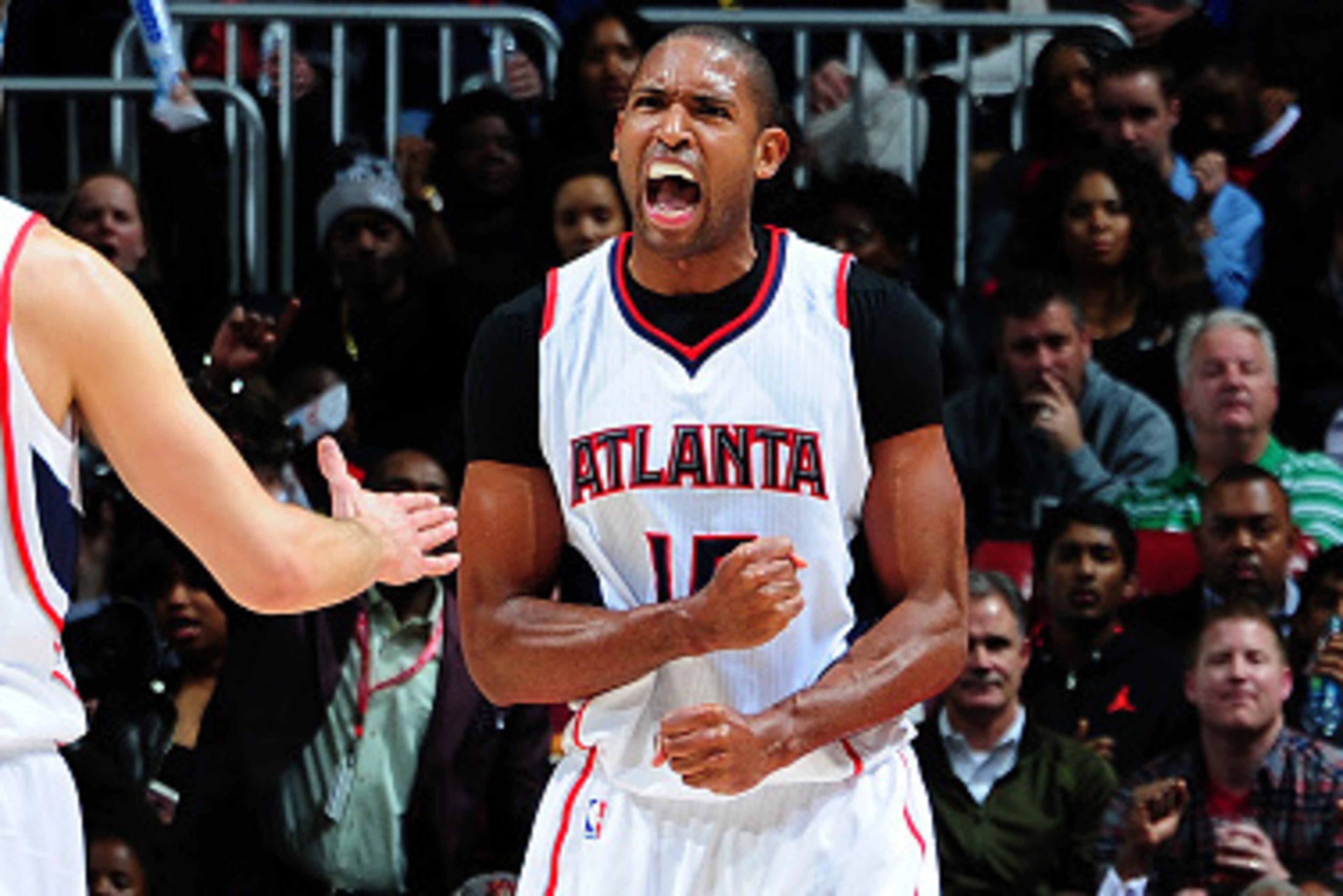 ATLANTA, GA - DECEMBER 15: Al Horford #15 of the Atlanta Hawks celebrates after a score against the Chicago Bulls on December 15, 2014 at Philips Arena in Atlanta, Georgia. NOTE TO USER: User expressly acknowledges and agrees that, by downloading and/or ATLANTA, GA - DECEMBER 15: Al Horford #15 of the Atlanta Hawks celebrates after a score against the Chicago Bulls on December 15, 2014 at Philips Arena in Atlanta, Georgia. NOTE TO USER: User expressly acknowledges and agrees that, by downloading and/or