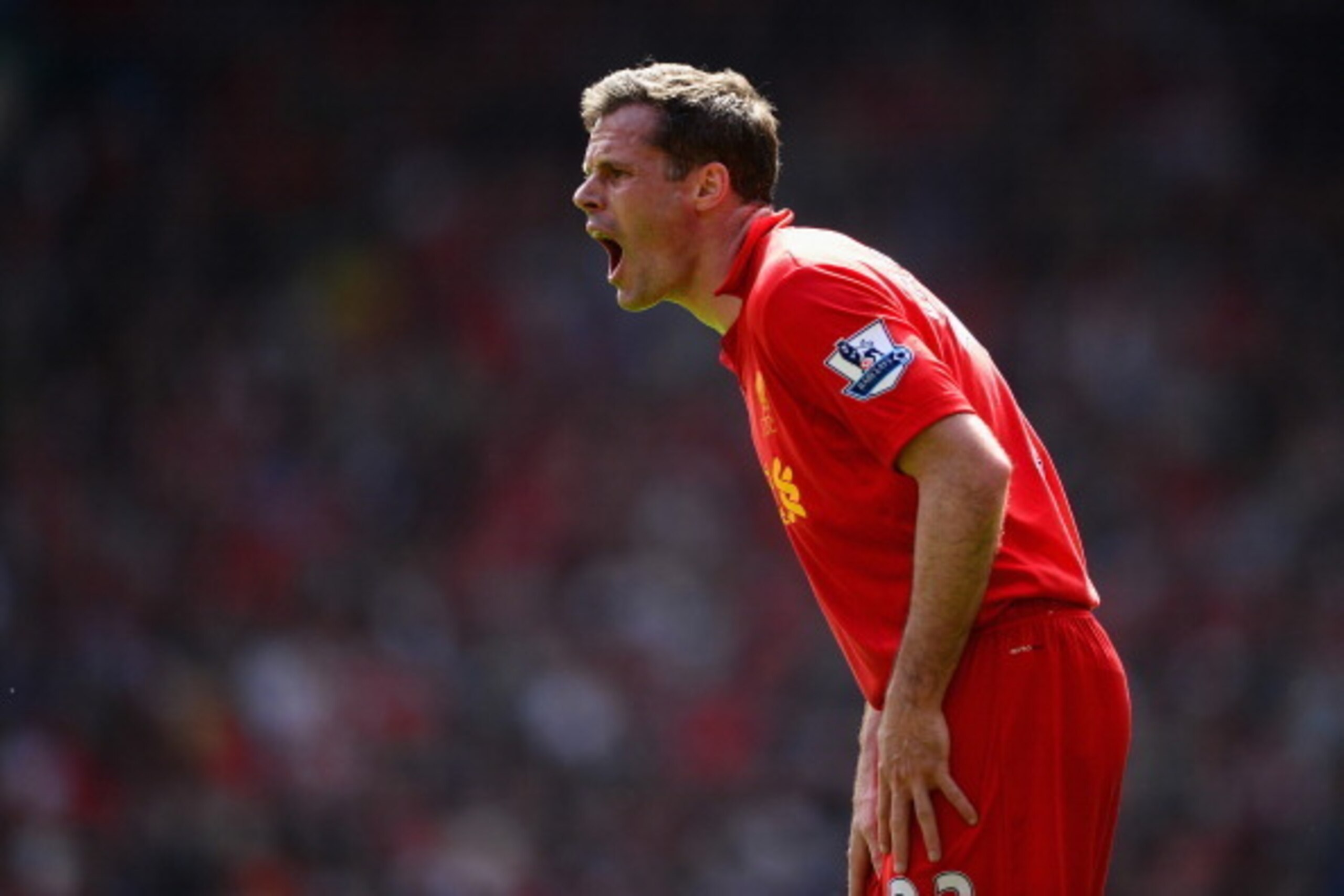 LIVERPOOL, ENGLAND - MAY 05:  Jamie Carragher of Liverpool shouts to his team-mates during the Barclays Premier League match between Liverpool and Everton at Anfield on May 5, 2013 in Liverpool, England.  (Photo by Laurence Griffiths/Getty Images)