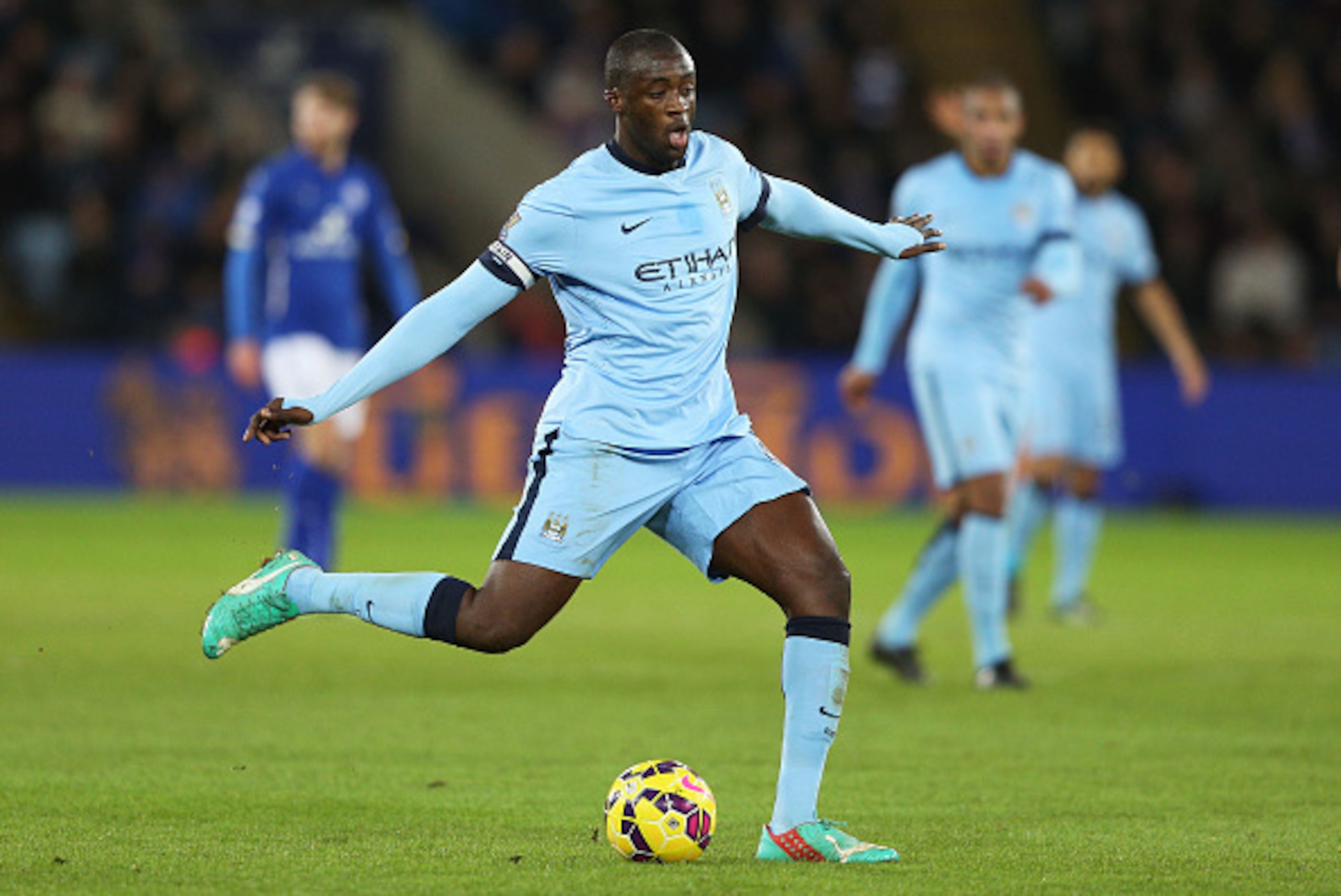 LEICESTER, ENGLAND - DECEMBER 13:  Yaya Toure of Manchester City passes the ball during the Barclays Premier League match between Leicester City and Manchester City at The King Power Stadium on December 13, 2014 in Leicester, England.  (Photo by Clive Mas