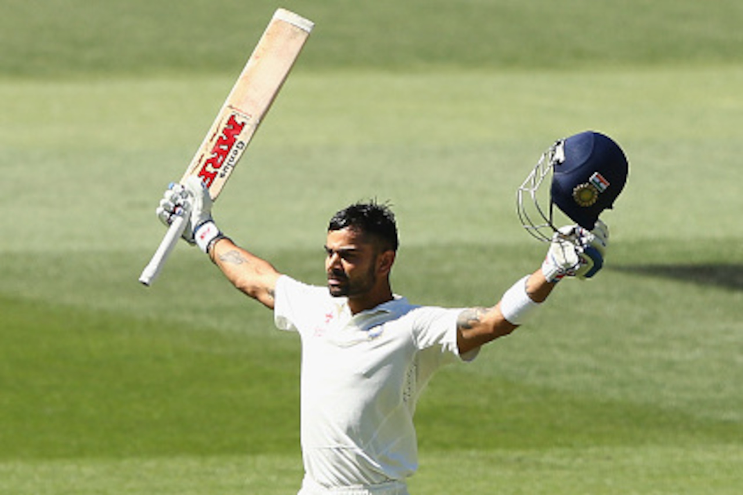 ADELAIDE, AUSTRALIA - DECEMBER 13:  Virat Kohli of India celebrates after reaching his century during day five of the First Test match between Australia and India at Adelaide Oval on December 13, 2014 in Adelaide, Australia.  (Photo by Robert Cianflone/Ge