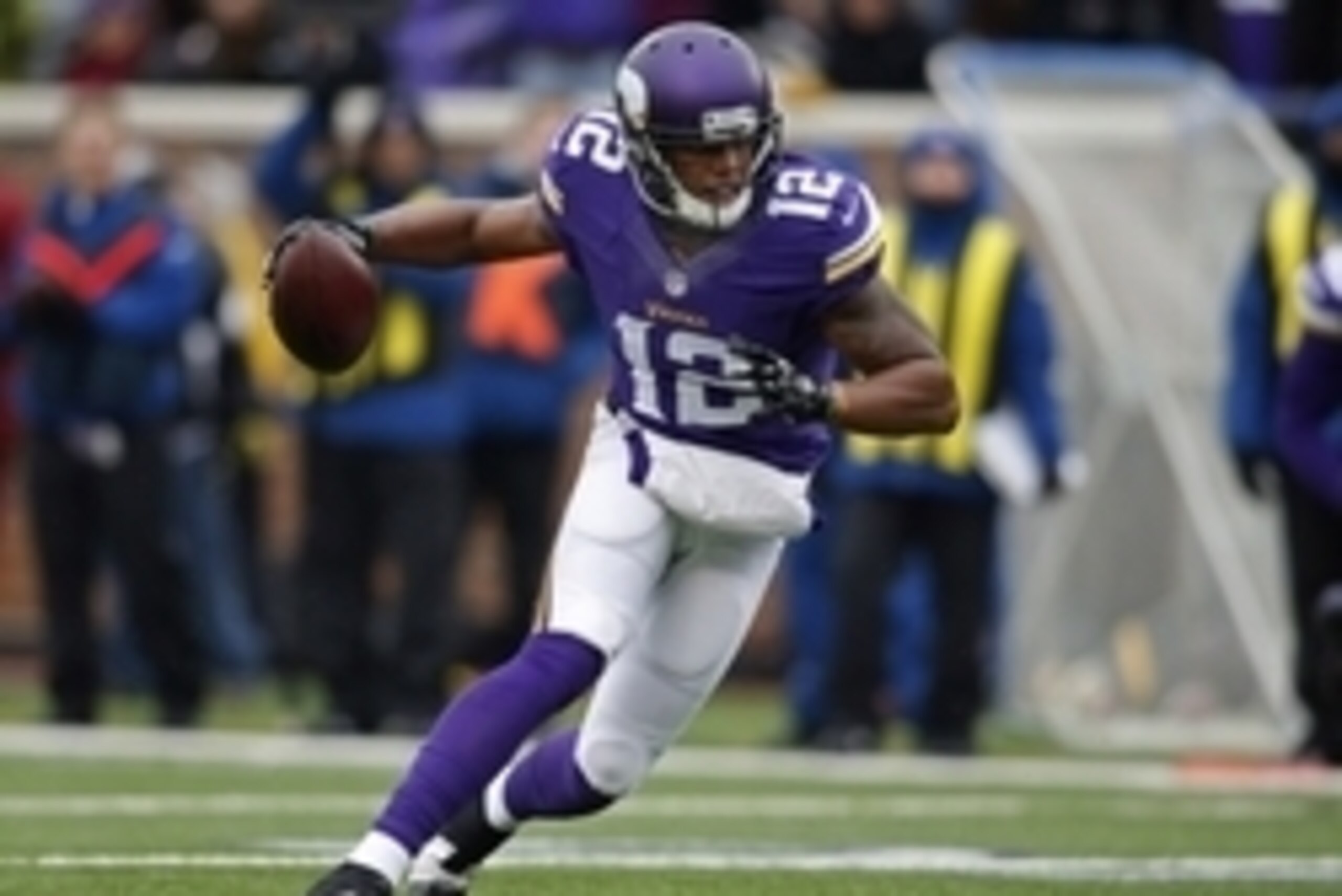 Dec 7, 2014; Minneapolis, MN, USA; Minnesota Vikings wide receiver Charles Johnson (12) catches a pass against the New York Jets but fumbles it at the goal line before the Vikings recover it for a touchdown in the second quarter at TCF Bank Stadium. Manda