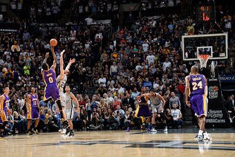 SAN ANTONIO - DECEMBER 12: Nick Young #0 of the Los Angeles Lakers takes a shot in the final seconds of OT to win the game against the San Antonio Spurs at the AT&T Center on December 12, 2014 in San Antonio, Texas. NOTE TO USER: User expressly acknowledg