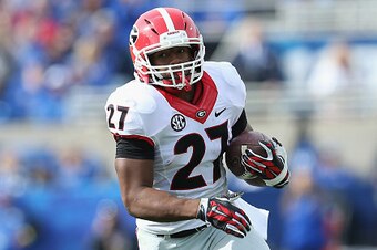 LEXINGTON, KY - NOVEMBER 08:  Nick Chubb #27 of the Georgia Bulldogs runs with the ball during the game against the Kentucky Wildcats at Commonwealth Stadium on November 8, 2014 in Lexington, Kentucky.  (Photo by Andy Lyons/Getty Images)