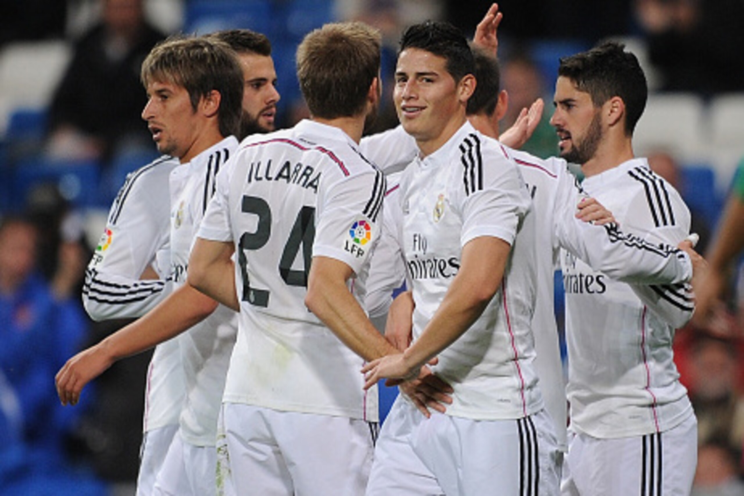 MADRID, SPAIN - DECEMBER 02:  James Rodriguez celebrates after scoring Real's opening goal during the Copa Del Rey Round of 32, Second Leg match between Real Madrid CF and Cornella at Santiago Bernabeu stadium on December 2, 2014 in Madrid, Spain.  (Photo