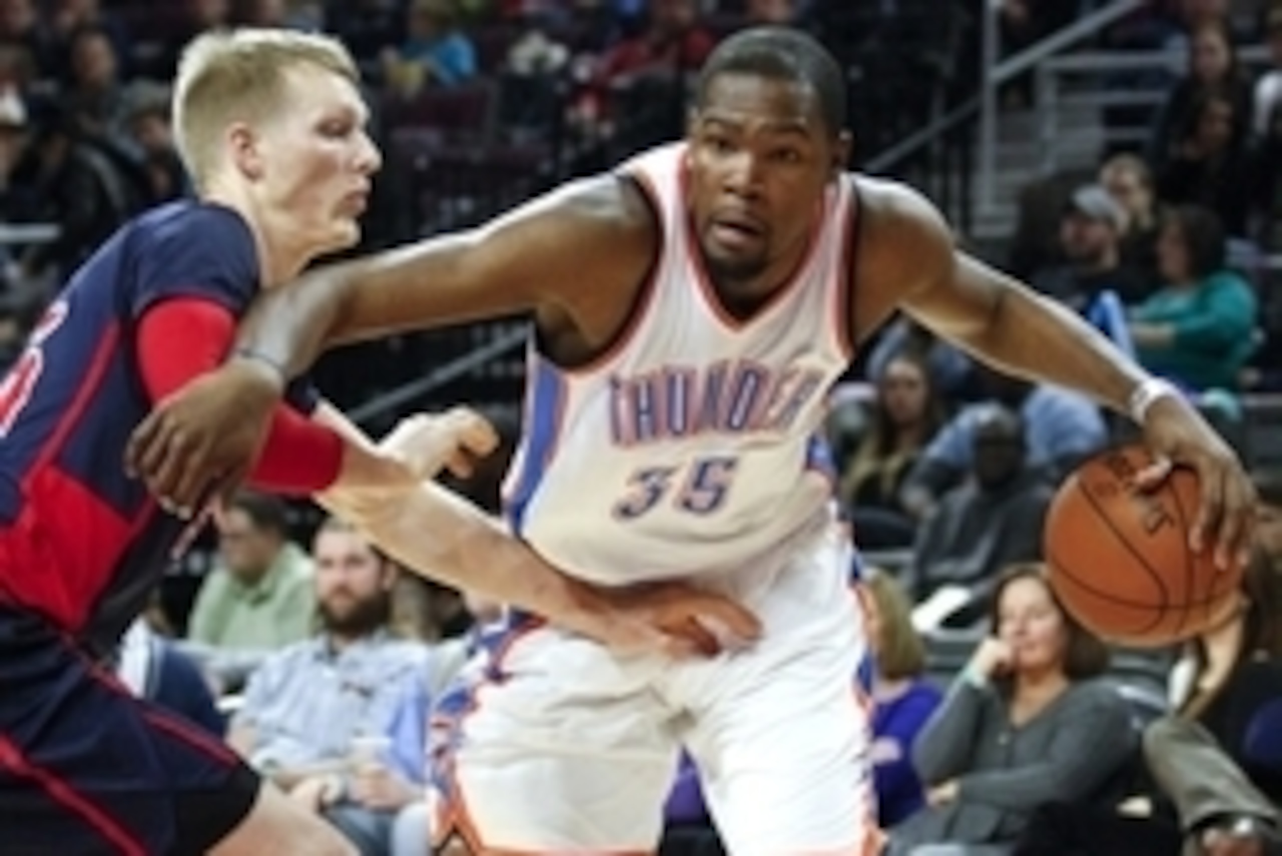 Dec 7, 2014; Auburn Hills, MI, USA; Oklahoma City Thunder forward Kevin Durant (35) defended by Detroit Pistons forward Kyle Singler (25) during the second quarter at The Palace of Auburn Hills. Mandatory Credit: Raj Mehta-USA TODAY Sports