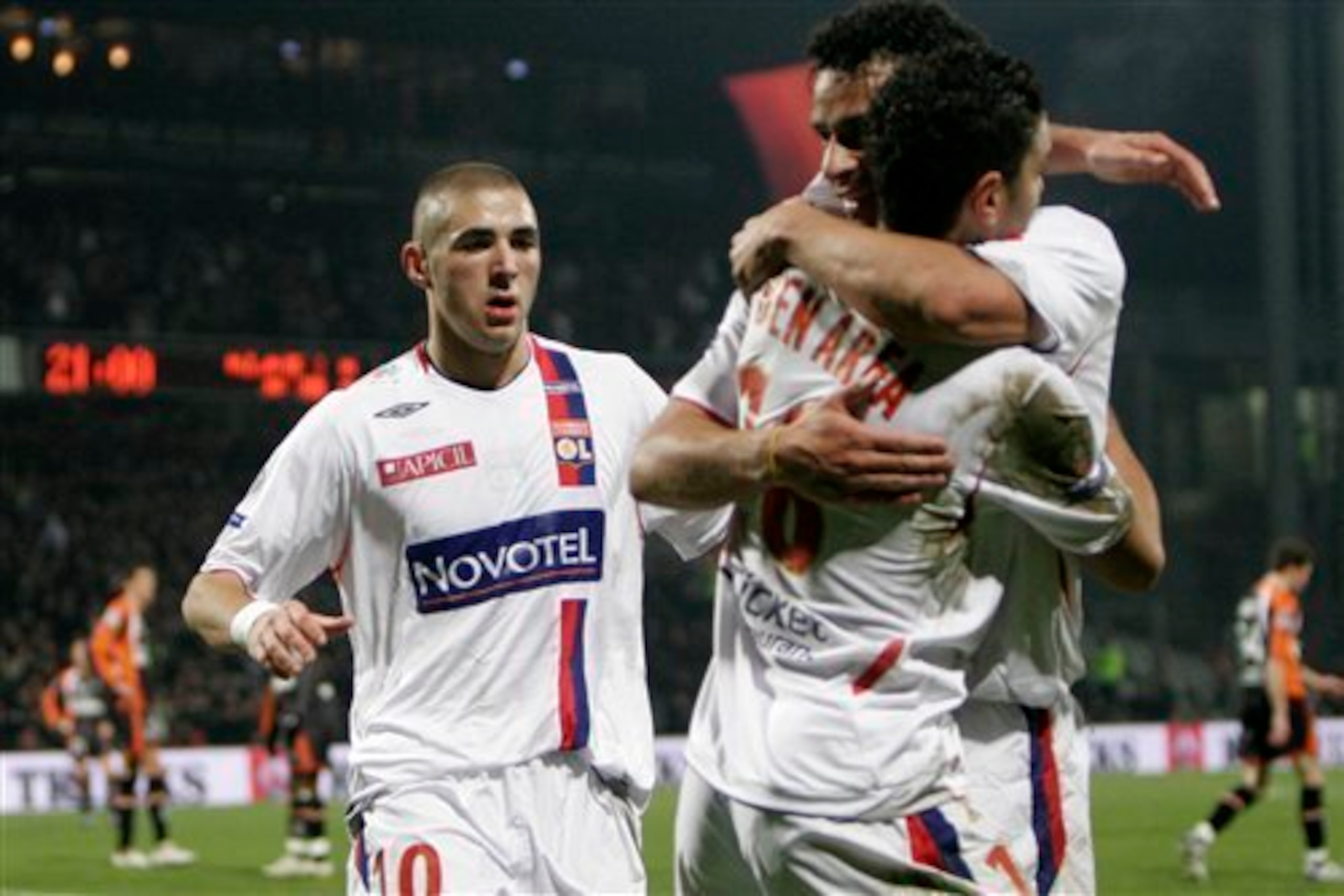 Karim Benzema, Hatem Ben Arfa and Fred celebrate a 2008 goal for Lyon.