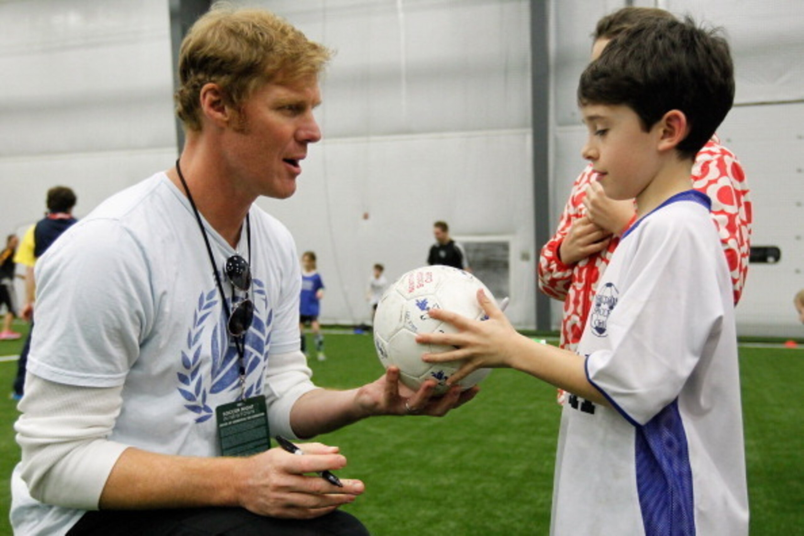 NEWTOWN, CT - JANUARY 07: US Soccer Legend Alexi Lalas signs autographs during Soccer Night In Newtown at Newtown Youth Academy Sports & Fitness Center on January 7, 2013 in Newtown, Connecticut.  (Photo by Mike Stobe/Getty Images)