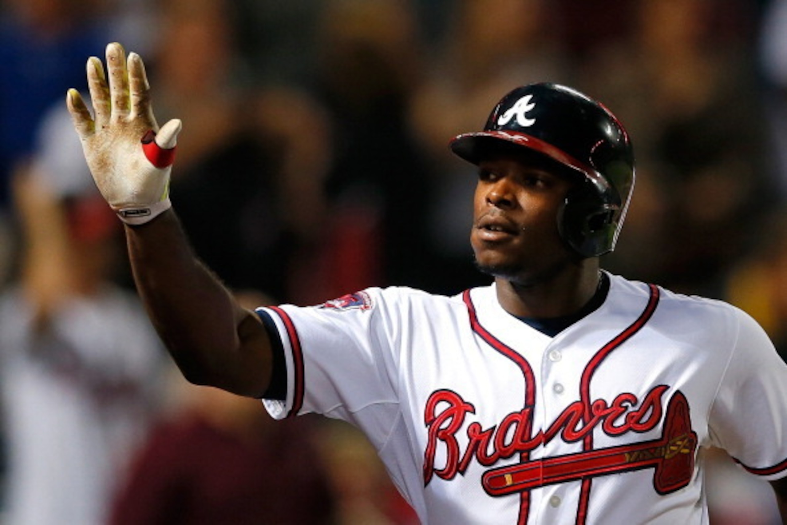 ATLANTA, GA - MAY 19: Justin Upton #8 of the Atlanta Braves celebrates hitting a two-run homer in the eighth inning against the Milwaukee Brewers that also scored Jason Heyward #22 at Turner Field on May 19, 2014 in Atlanta, Georgia. (Photo by Kevin C. ATLANTA, GA - MAY 19: Justin Upton #8 of the Atlanta Braves celebrates hitting a two-run homer in the eighth inning against the Milwaukee Brewers that also scored Jason Heyward #22 at Turner Field on May 19, 2014 in Atlanta, Georgia. (Photo by Kevin C.