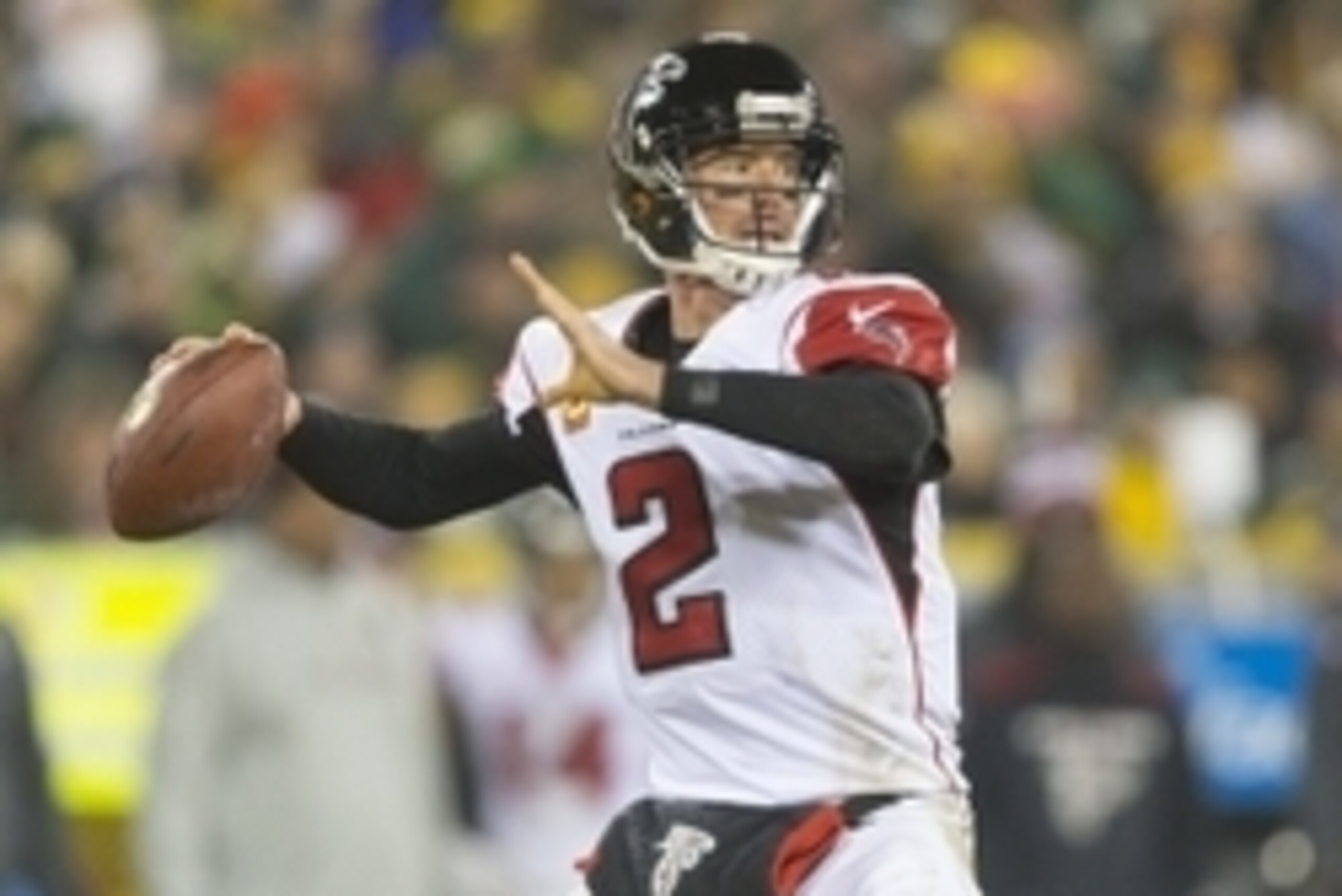 Dec 8, 2014; Green Bay, WI, USA; Atlanta Falcons quarterback Matt Ryan (2) throws a pass during the third quarter against the Green Bay Packers at Lambeau Field.  Green Bay won 43-37.  Mandatory Credit: Jeff Hanisch-USA TODAY Sports