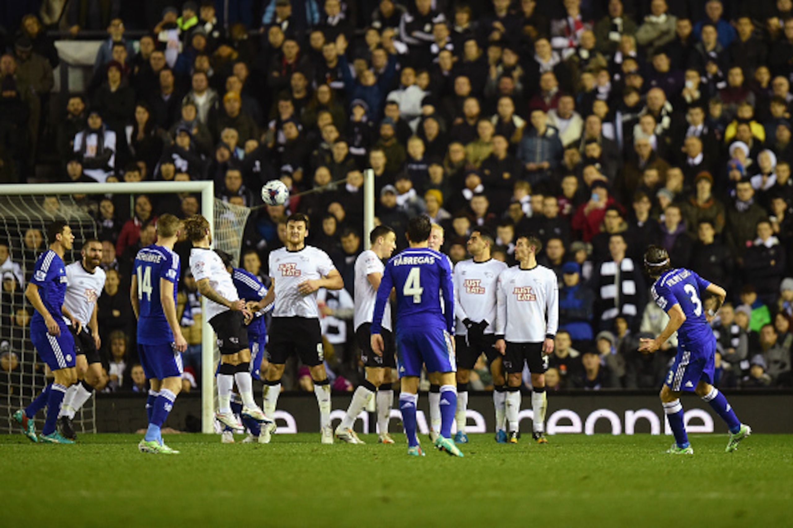 DERBY, ENGLAND - DECEMBER 16:  Filipe Luis of Chelsea scores his team's second goal during the Capital One Cup Quarter-Final match between Derby County and Chelsea at Pride Park Stadium on December 16, 2014 in Derby, England.  (Photo by Jamie McDonald/Get