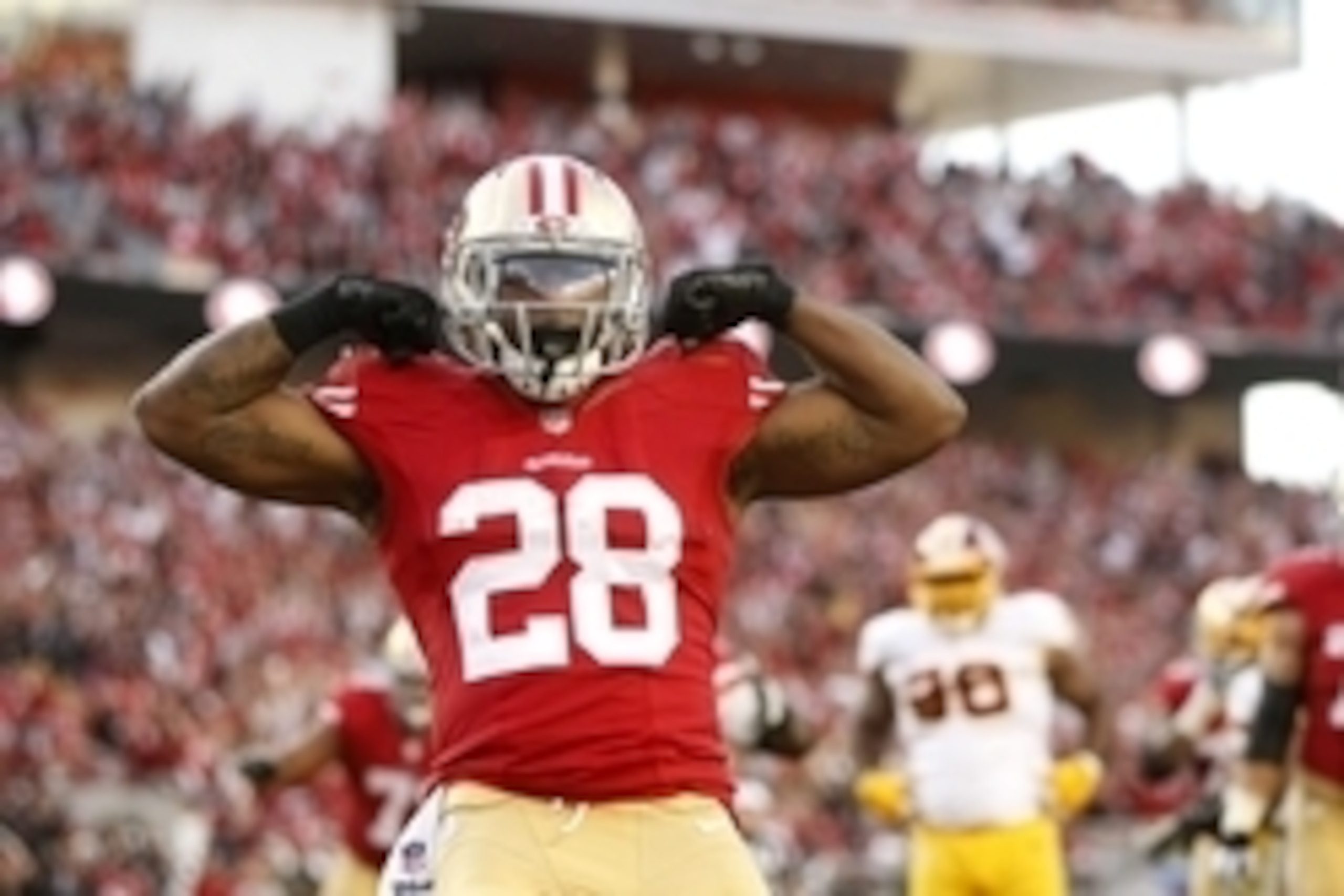Nov 23, 2014; Santa Clara, CA, USA; San Francisco 49ers running back Carlos Hyde (28) reacts after scoring a touchdown against the Washington Redskins in the fourth quarter at Levi's Stadium. The 49ers defeated the Redskins 17-13. Mandatory Credit: Cary E