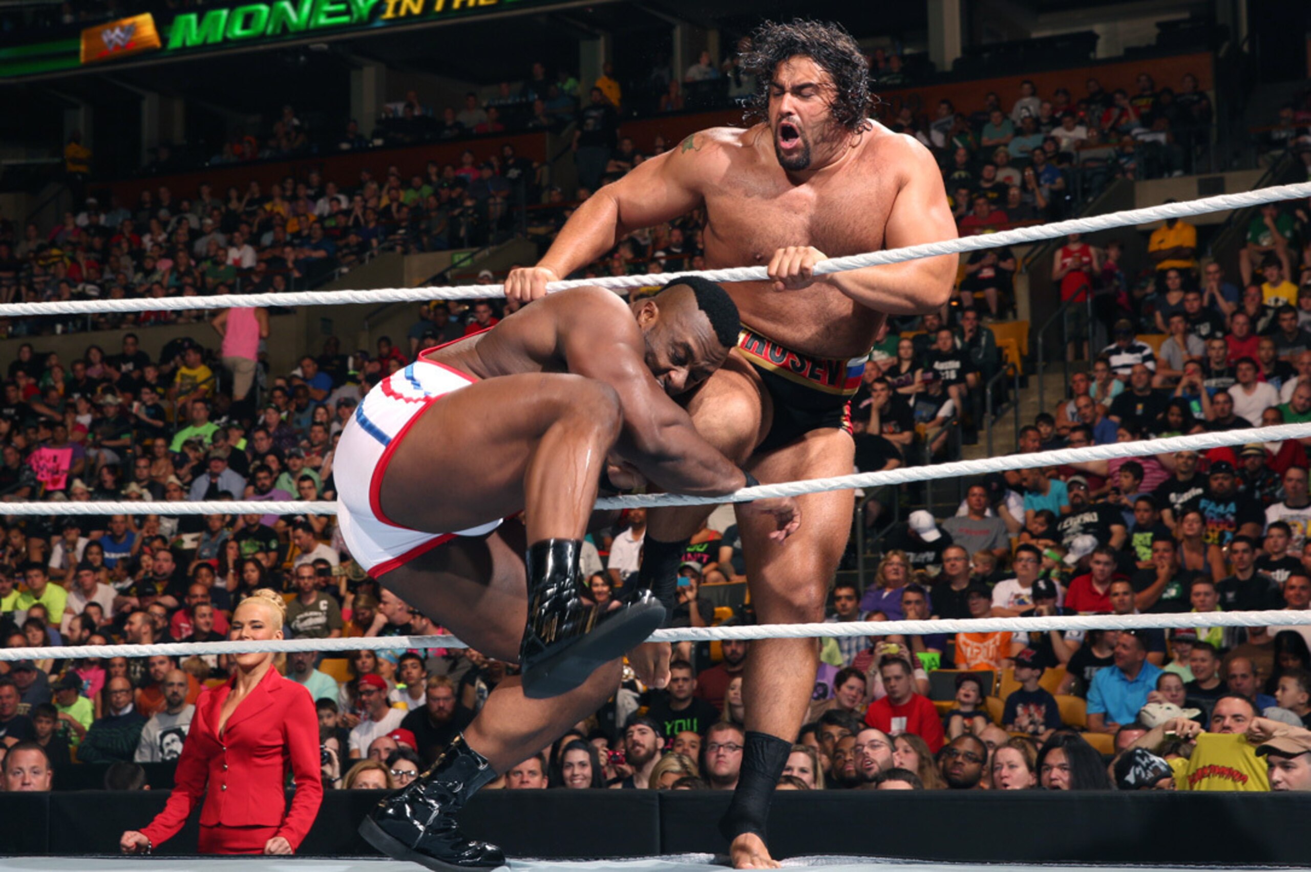 Big E collides with Rusev.